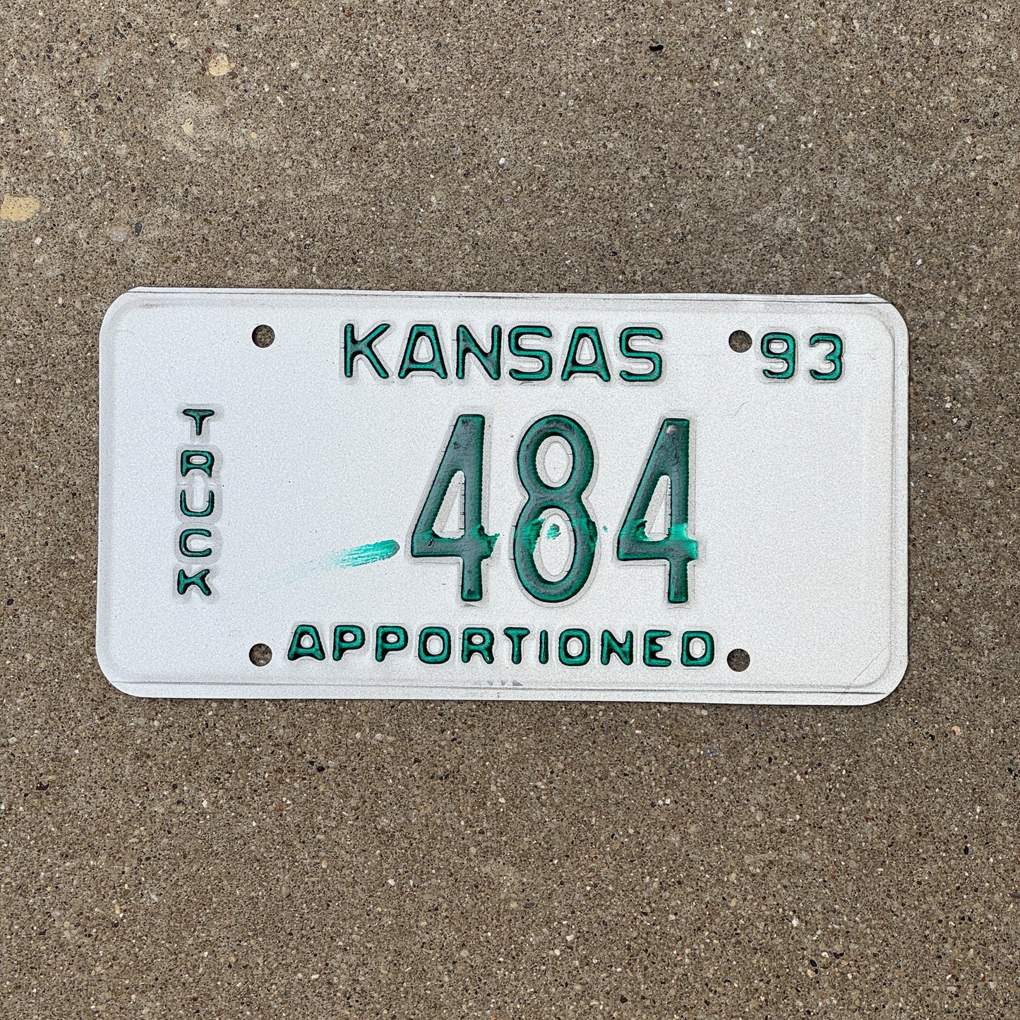 Photo of a 1993 Kansas Apportioned Truck Error License Plate Auto Tag Garage Decor Vintage Misprint 484