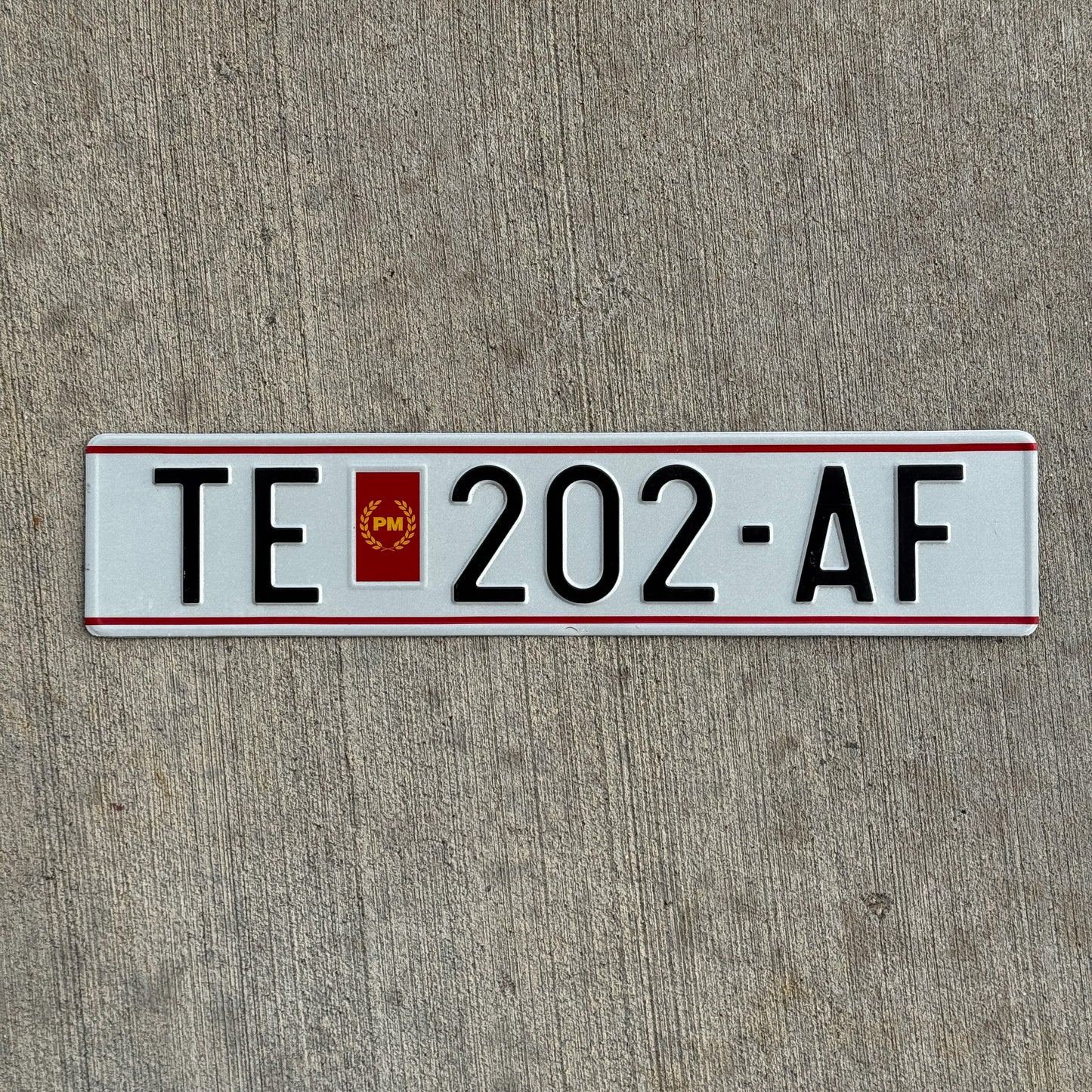 Photo of a 1993 Macedonia License Plate Auto Tag Garage Decor Vintage Tetovo TE 202 AF with original patina