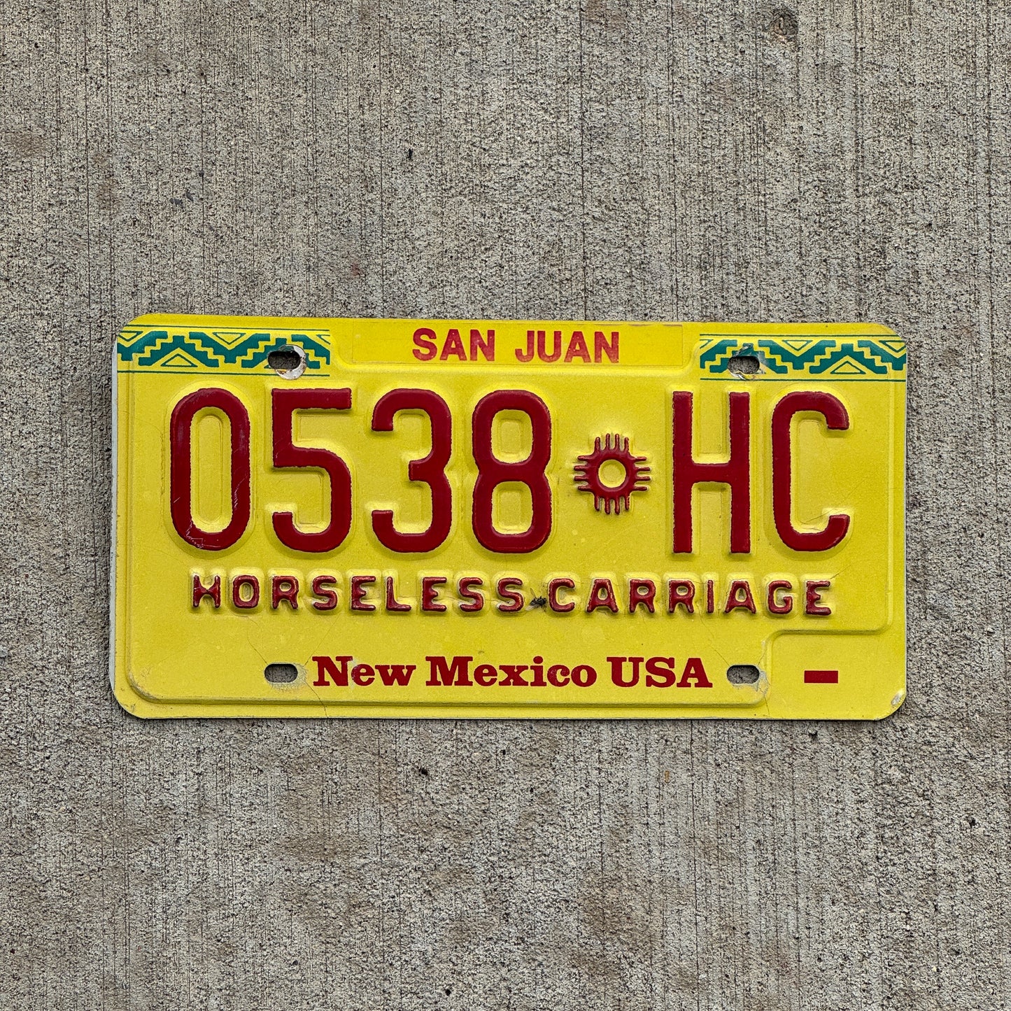 Photo of a 1993 New Mexico Horseless Carriage License Plate Auto Tag Garage Decor Vintage 0538 HC with original patina