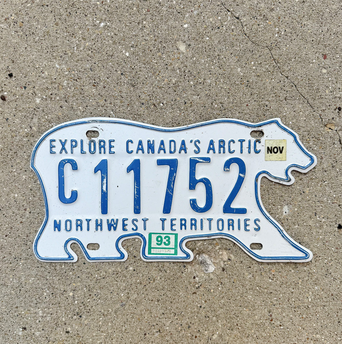 Photo of a 1993 Northwest Territories Commercial License Plate Auto Tag Garage Decor Vintage Polar Bear C 11752 with original patina