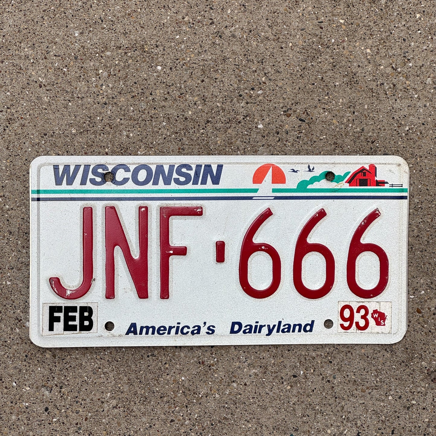 Photo of a 1993 Wisconsin License Plate Auto Tag Garage Decor Vintage Devil Evil Repeat JNF 666