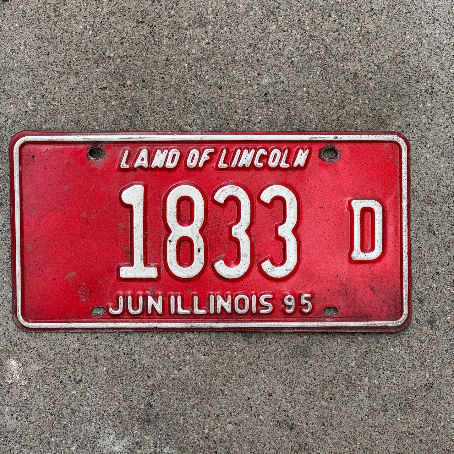 Photo of a 1994 1995 Illinois Truck License Plate Auto Tag Garage Decor Vintage 1833 D with original patina