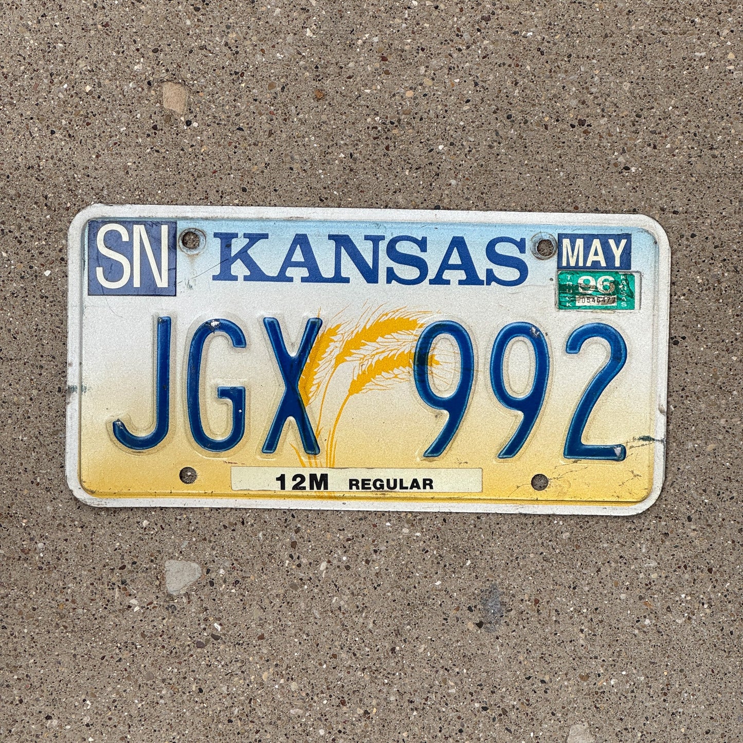 Photo of a 1994 1996 Kansas License Plate Auto Tag Garage Decor Vintage JGX 992