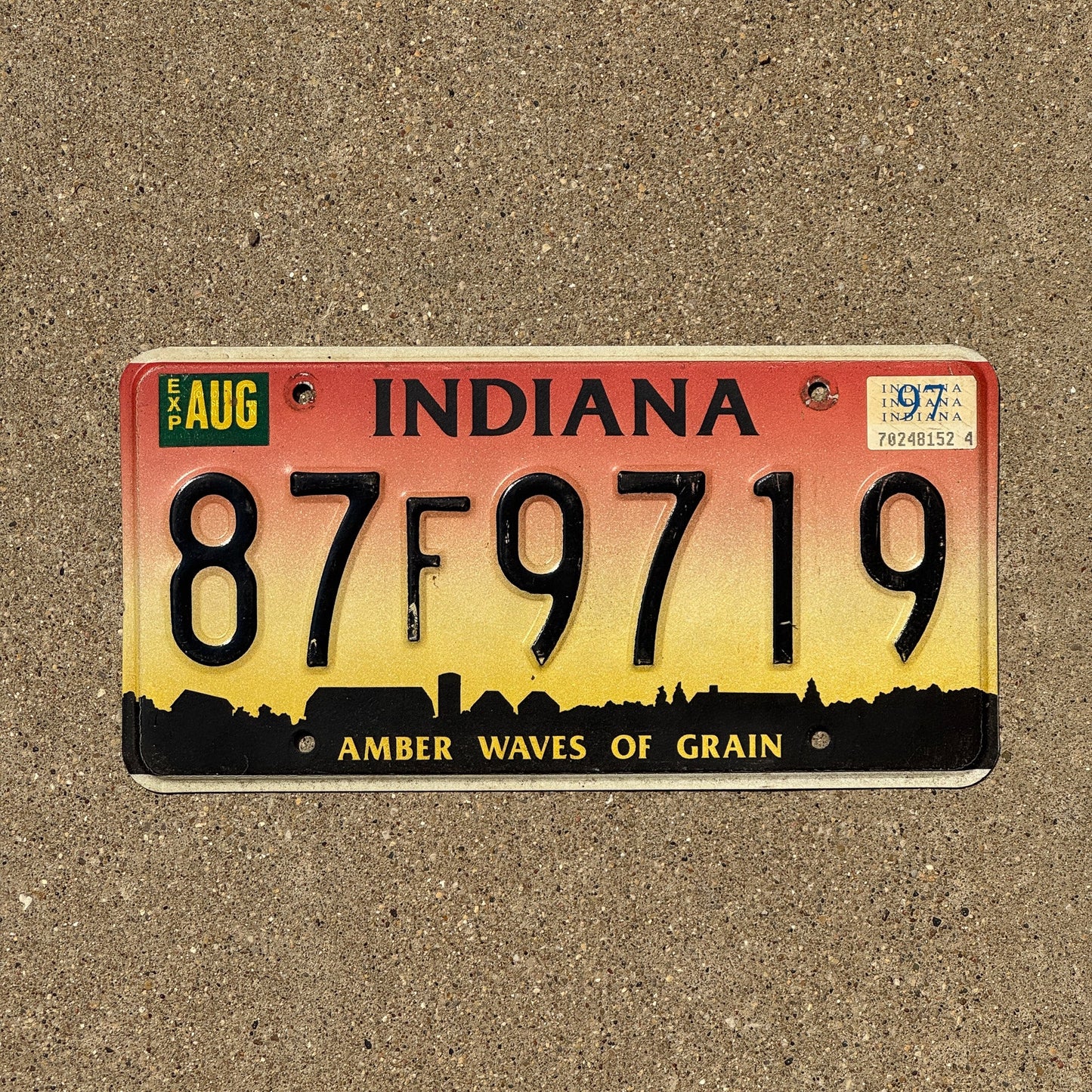 Photo of a 1994 1997 Indiana License Plate Auto Tag Garage Decor Vintage Waves of Grain 87 F 9719