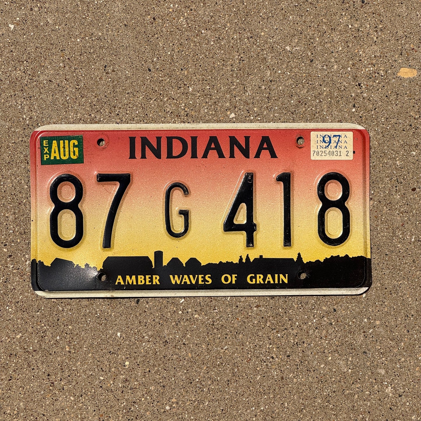 Photo of a 1994 1997 Indiana License Plate Auto Tag Garage Decor Vintage Waves of Grain 87 G 418