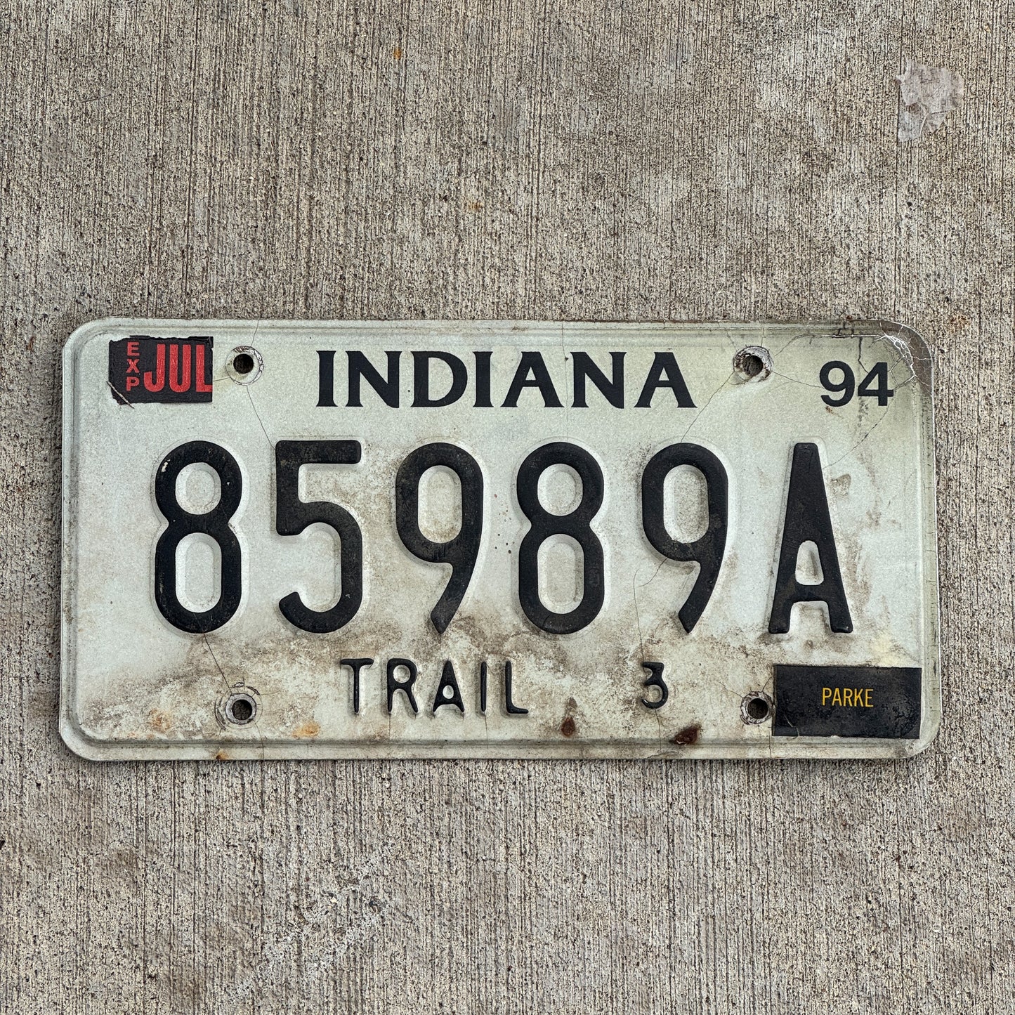 Photo of a 1994 Indiana Trailer License Plate Auto Tag Garage Decor Vintage 85989 A with original patina