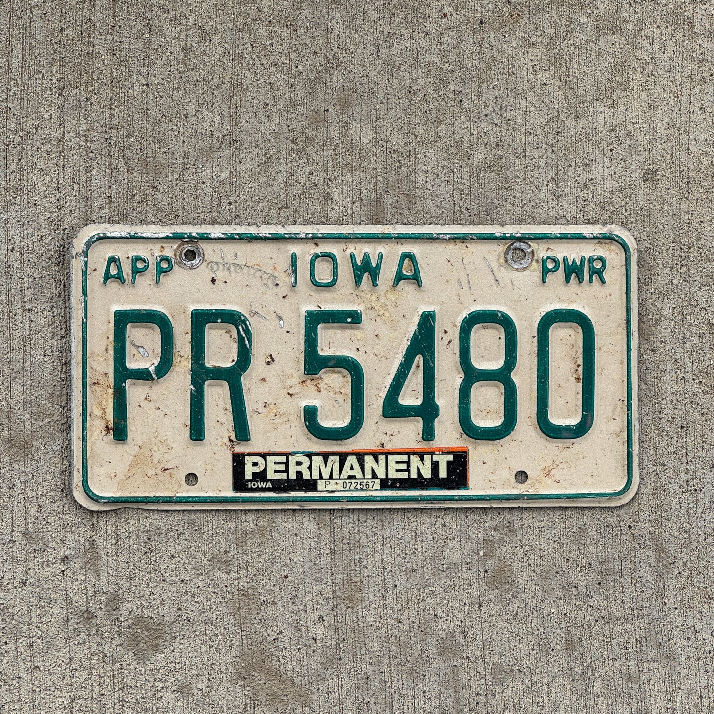 Photo of a 1994 Iowa Apportioned Power License Plate Auto Tag Garage Decor Vintage PR 5480 with original patina