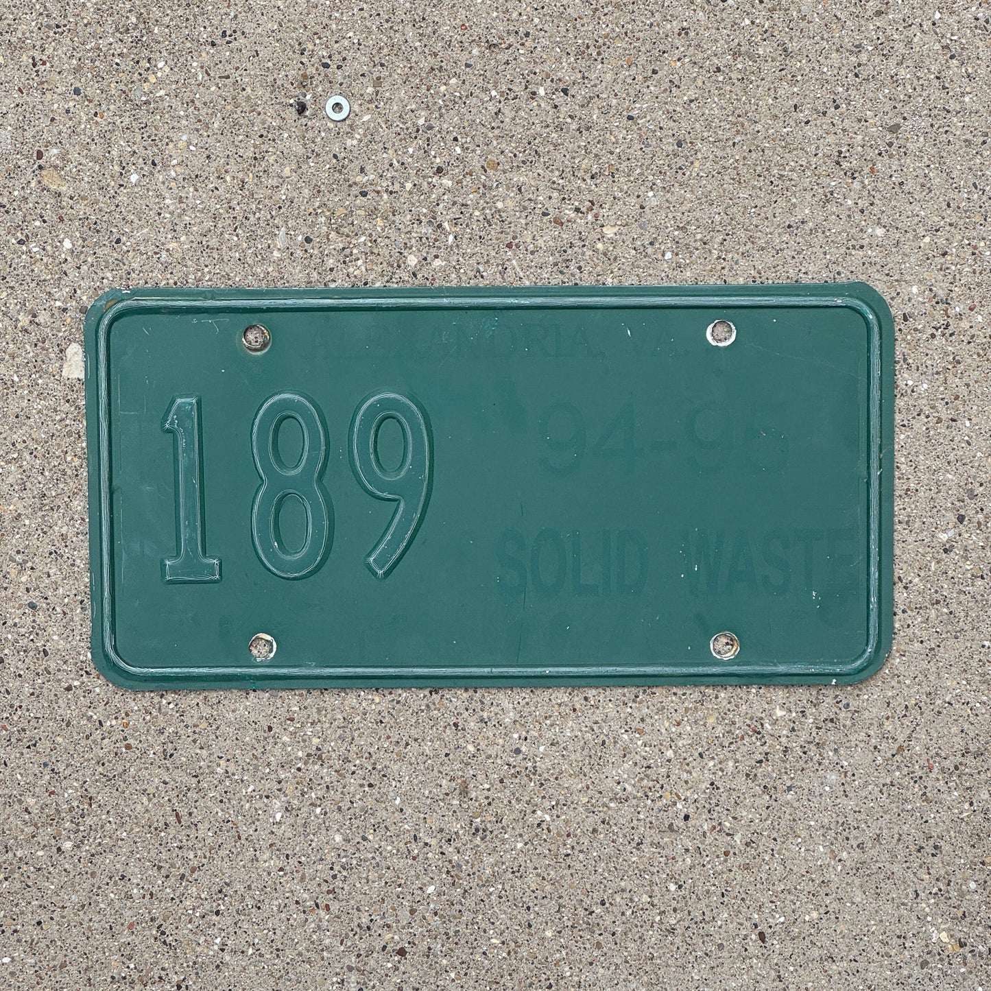 Photo of a 1994 Virginia Solid Waste License Plate Auto Tag Garage Decor Vintage 189