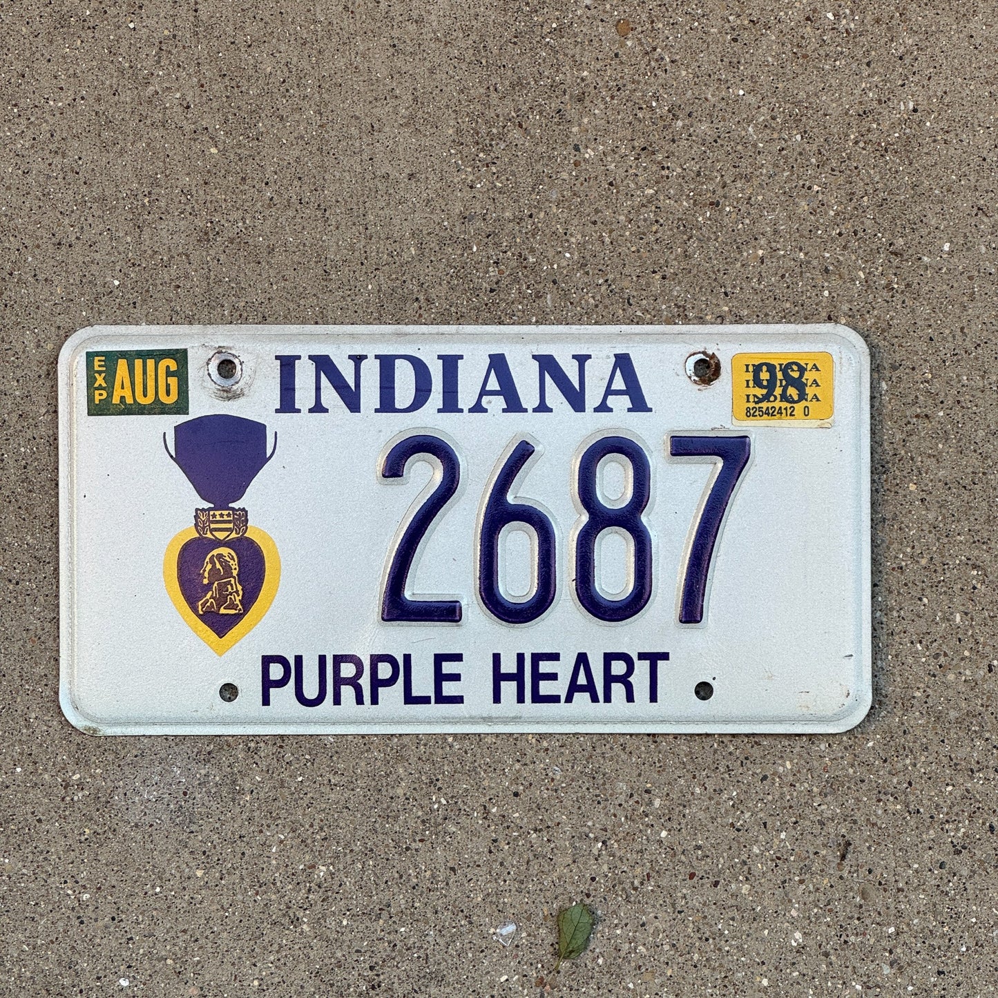 Photo of a 1995 1998 Indiana Military License Plate Auto Tag Garage Decor Vintage Purple Heart 2687 with original patina
