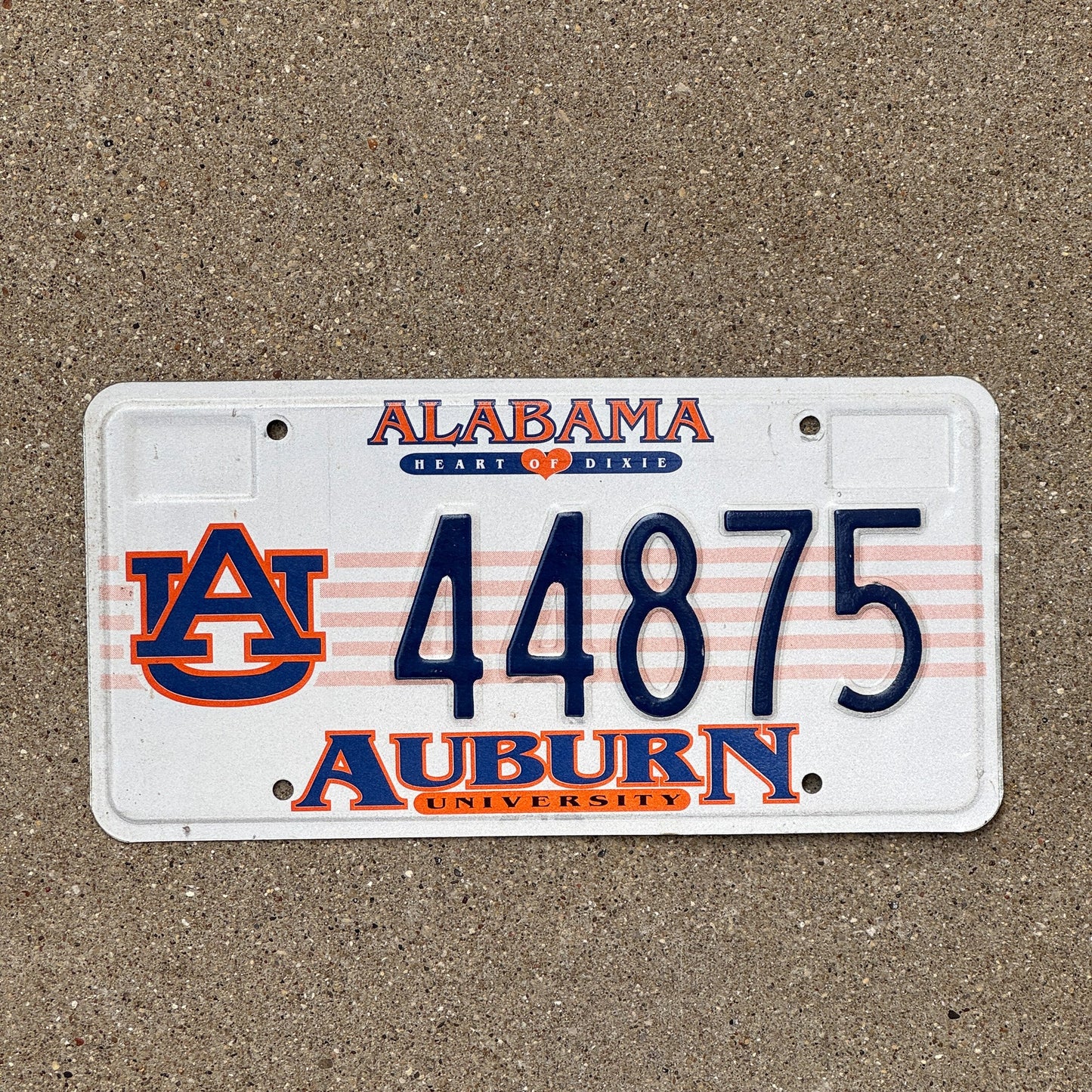 Photo of a 1995 Alabama Auburn University License Plate Auto Tag Garage Decor Vintage 44875