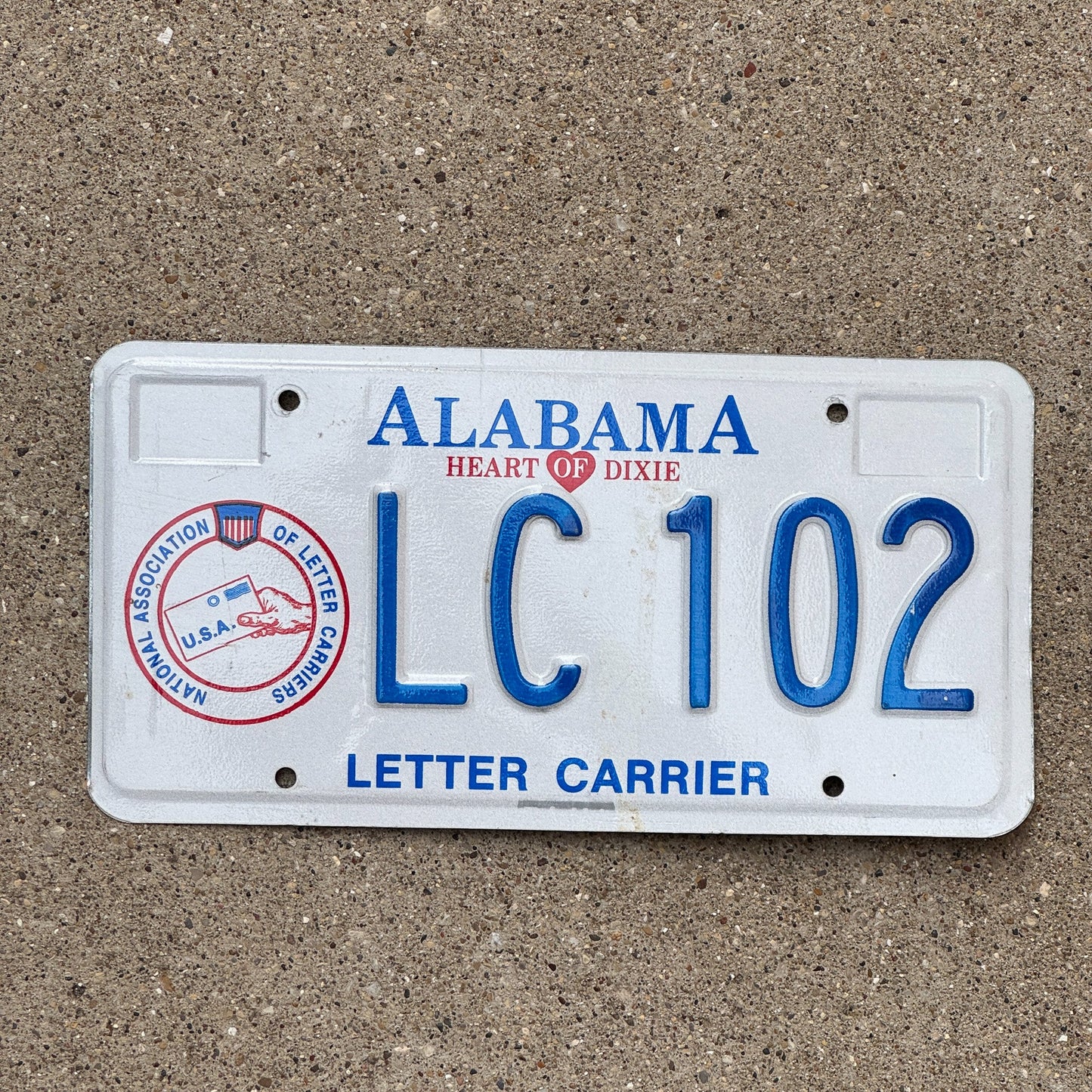 Photo of a 1995 Alabama Letter Carrier License Plate Auto Tag Garage Decor Vintage NALC USPS LC 102