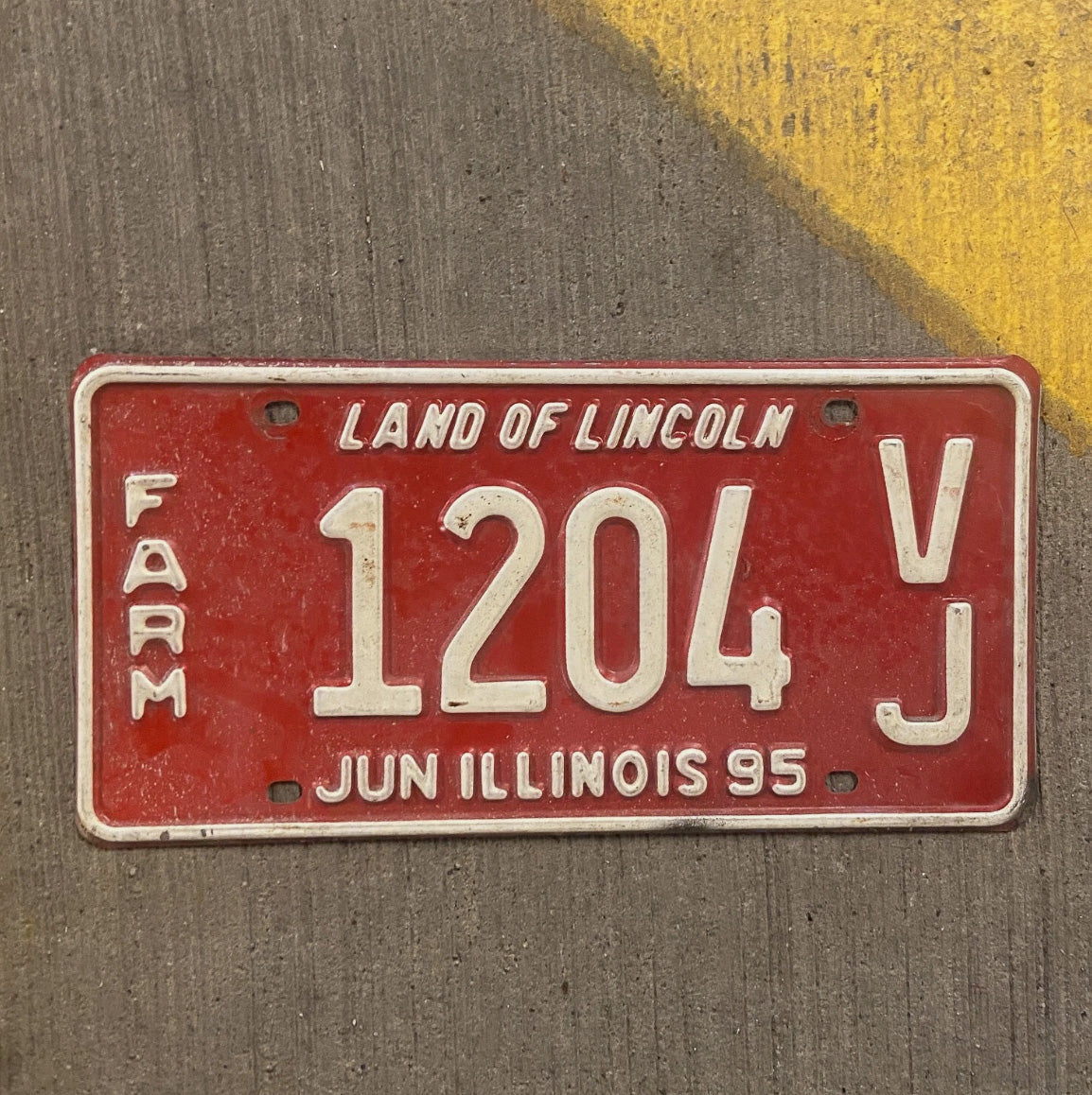 Photo of a 1995 Illinois Farm License Plate Auto Tag Garage Decor Vintage 1204 VJ