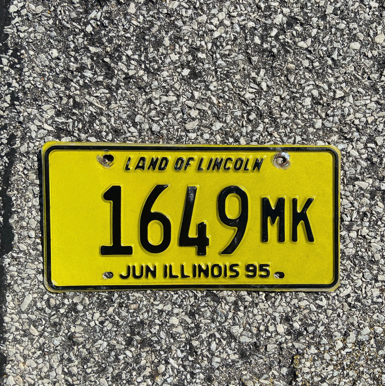 Photo of a 1995 Illinois Truck Mileage Tax License Plate Auto Tag 1 Garage Decor Low Number 1649 MK