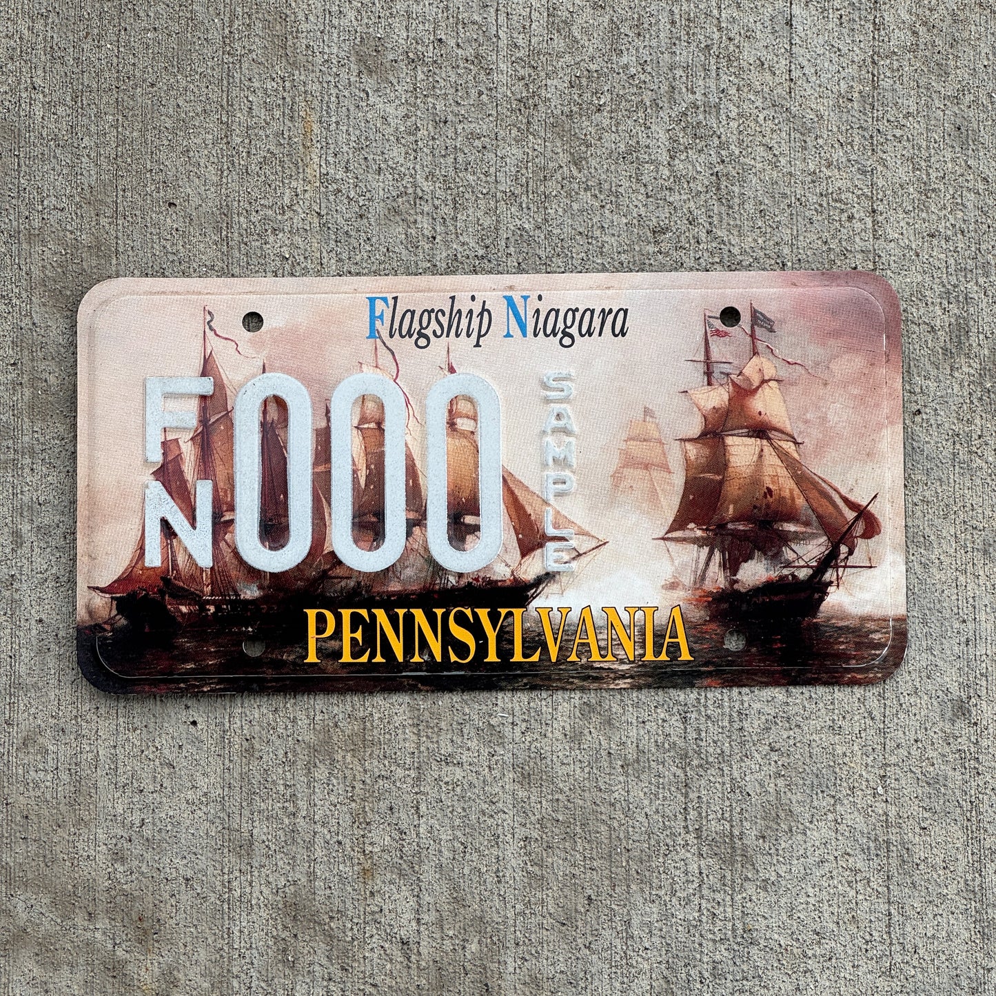 Photo of a 1995 Pennsylvania Graphic Sample License Plate Auto Tag Garage Decor Vintage Flagship Niagara FN 000 with original patina