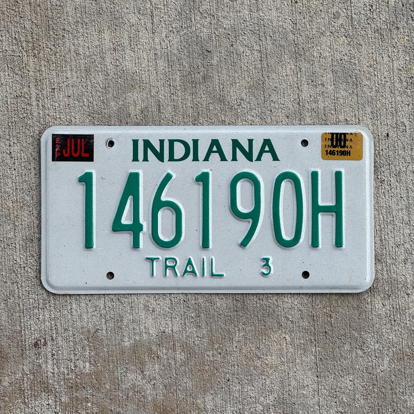 Photo of a 1996 2000 Indiana Trailer License Plate Auto Tag Garage Decor Vintage 146190 H with original patina