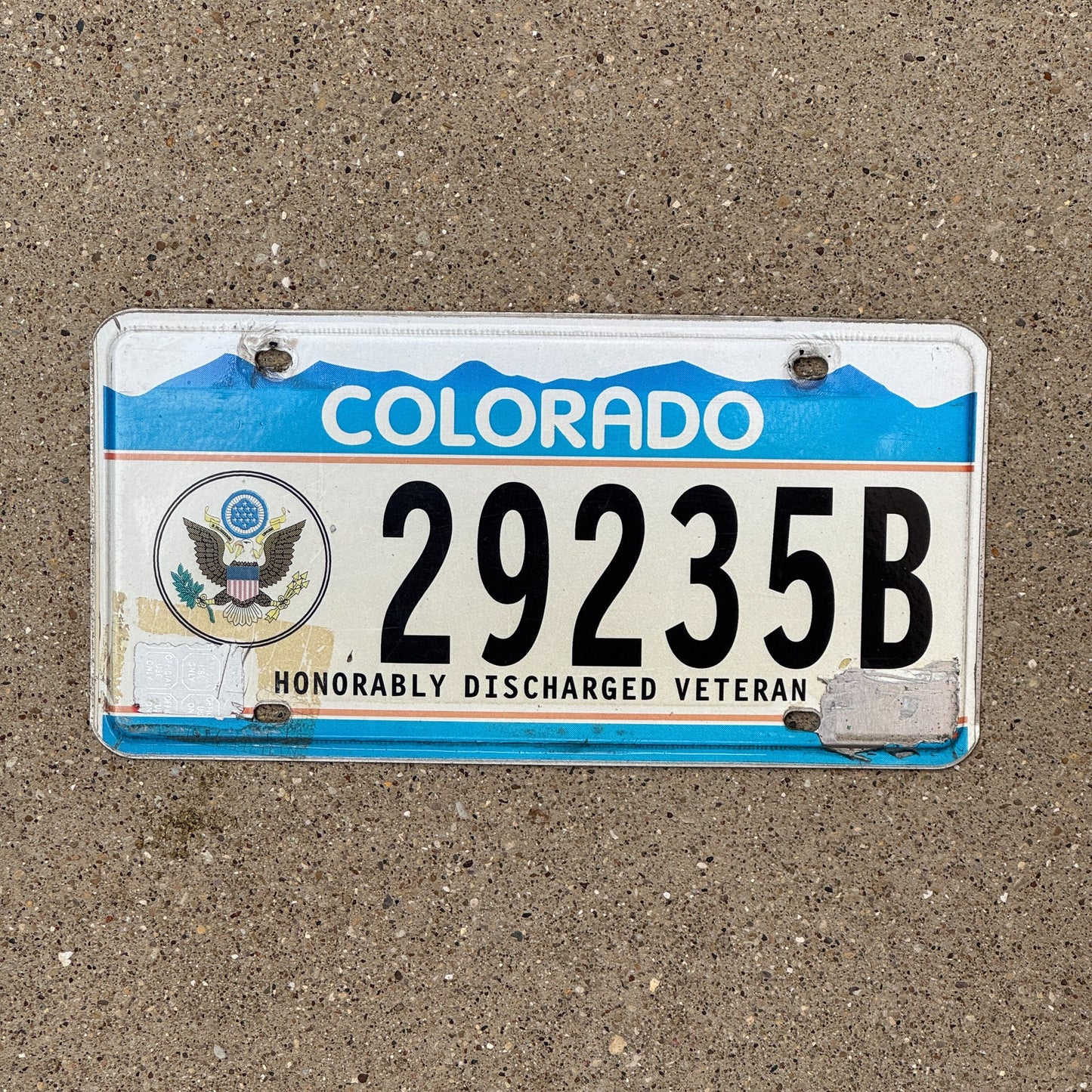 Photo of a 1996 Colorado Honorably Discharged License Plate Auto Tag Garage Decor Vintage Veteran Military 29235 B