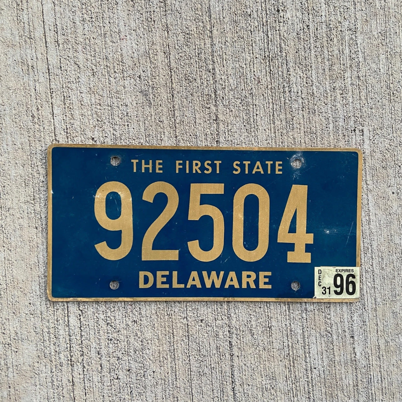 Photo of a 1996 Delaware License Plate Auto Tag Garage Decor Vintage DE Blue 92504
