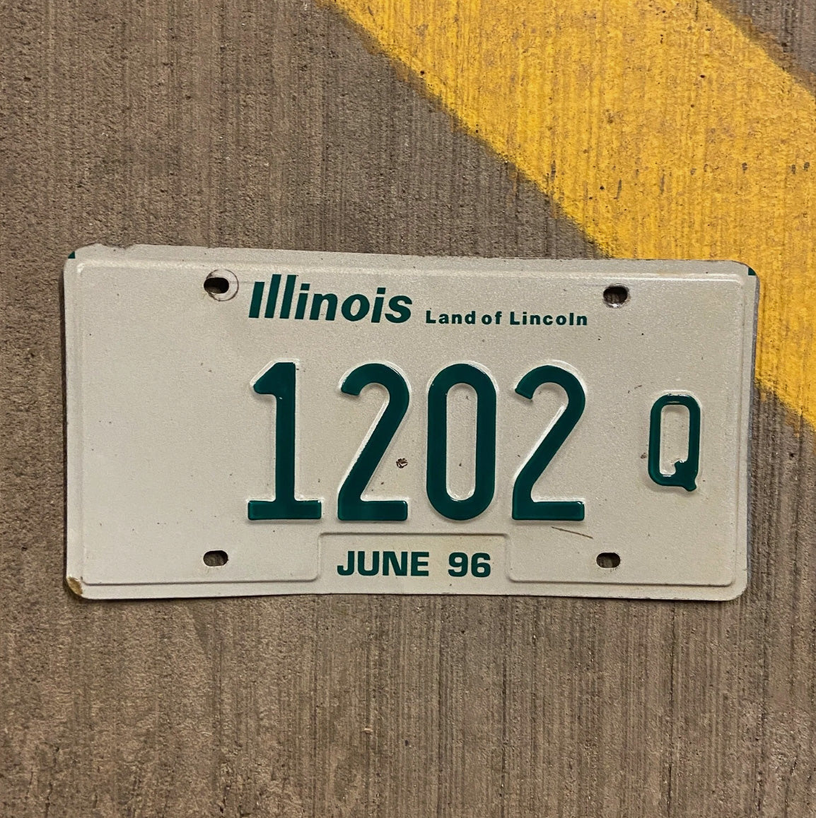 Photo of a 1996 Illinois Truck License Plate Auto Tag Garage Decor Vintage 1202 Q