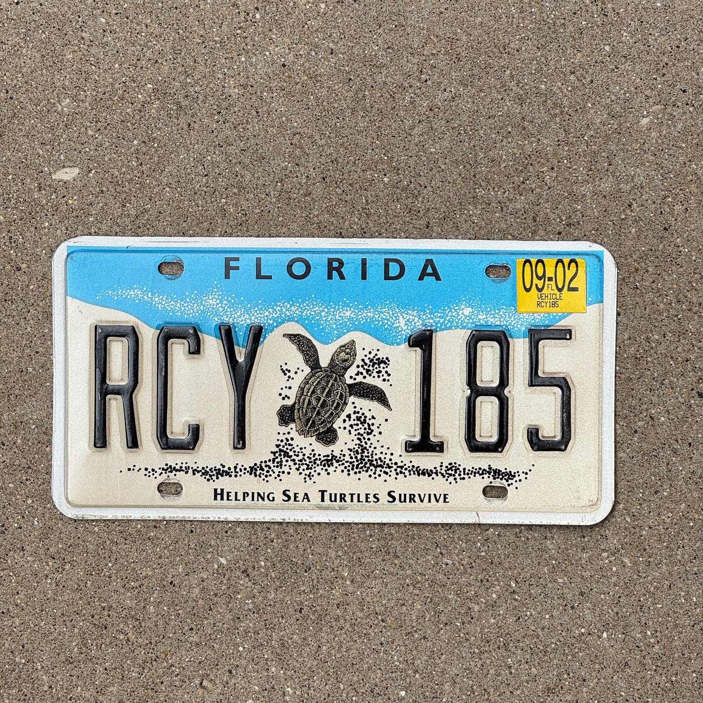 Photo of a 1997 2002 Florida Graphic / Specialty License Plate Auto Tag Garage Decor Vintage Helping Sea Turtles RCY 185