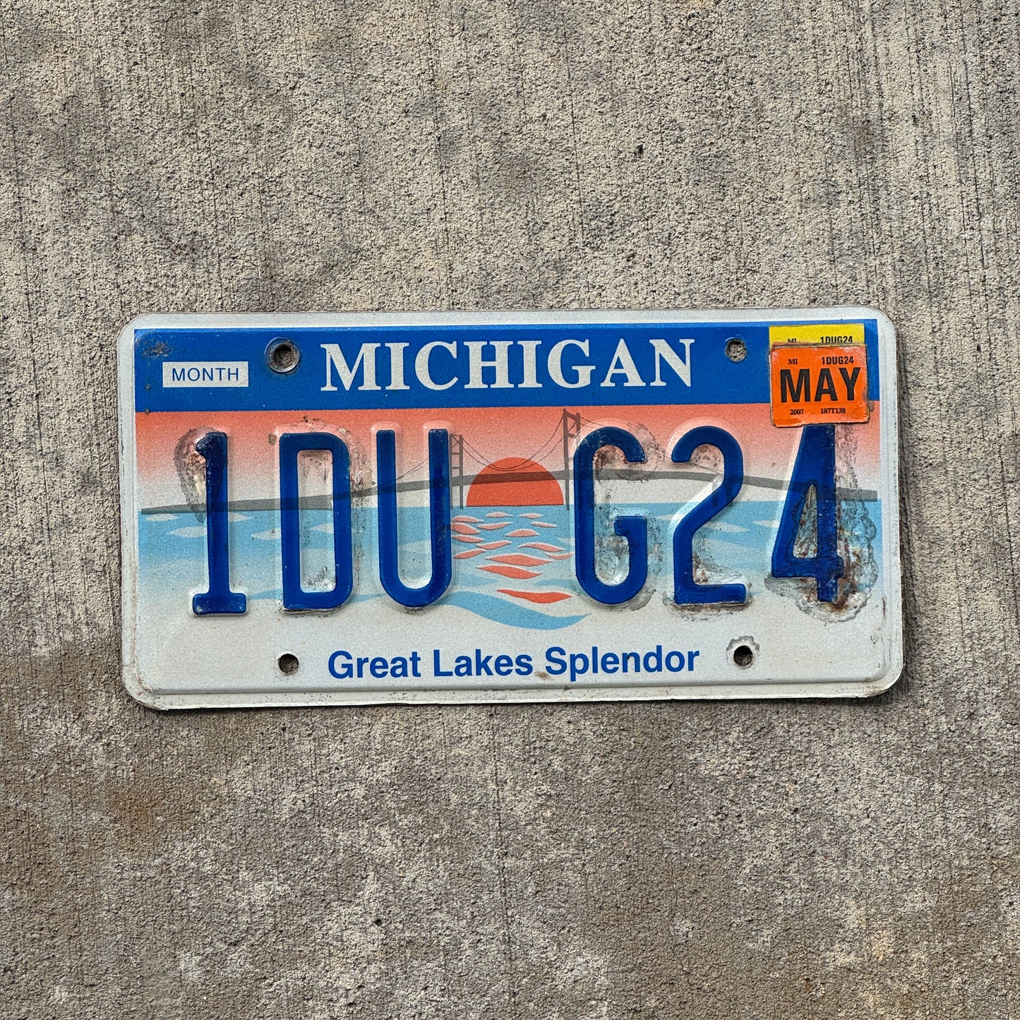 Photo of a 1997 2007 Michigan Graphic / Specialty License Plate Auto Tag Garage Decor Vintage Great Lakes Splendor 1 DU G24 with original patina