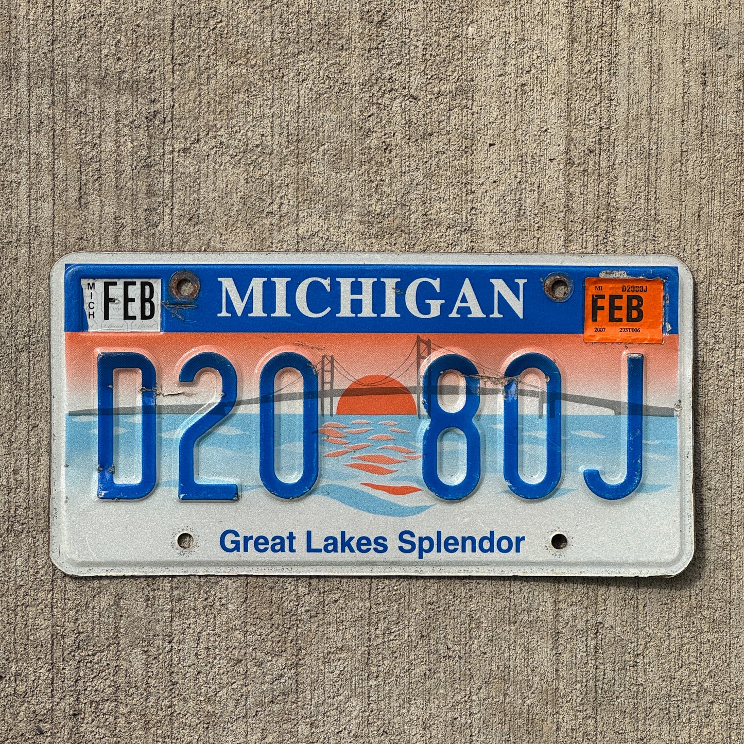 Photo of a 1997 2007 Michigan Graphic / Specialty License Plate Auto Tag Garage Decor Vintage Great Lakes Splendor D20 80J with original patina