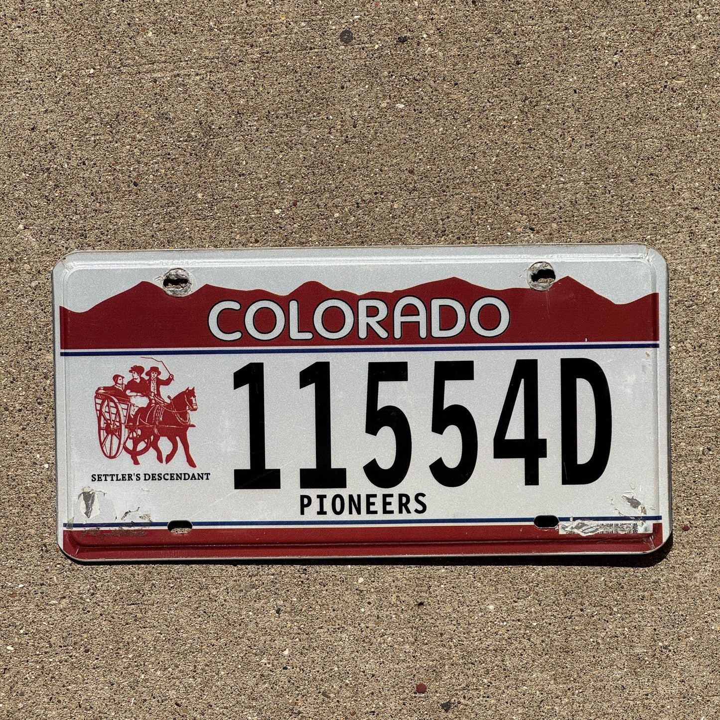 Photo of a 1997 Colorado Graphic / Specialty License Plate Auto Tag Garage Decor Vintage Pioneers Settler Descedent 11554 D