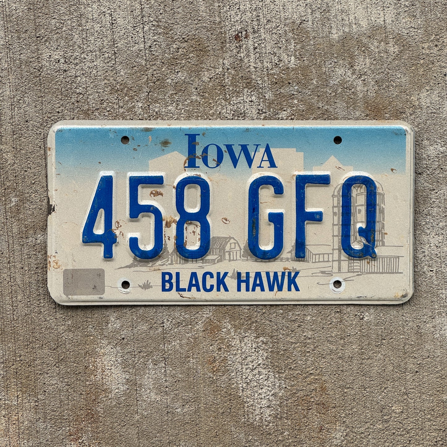 Photo of a 1997 Iowa License Plate Auto Tag Garage Decor Vintage 458 GFQ with original patina