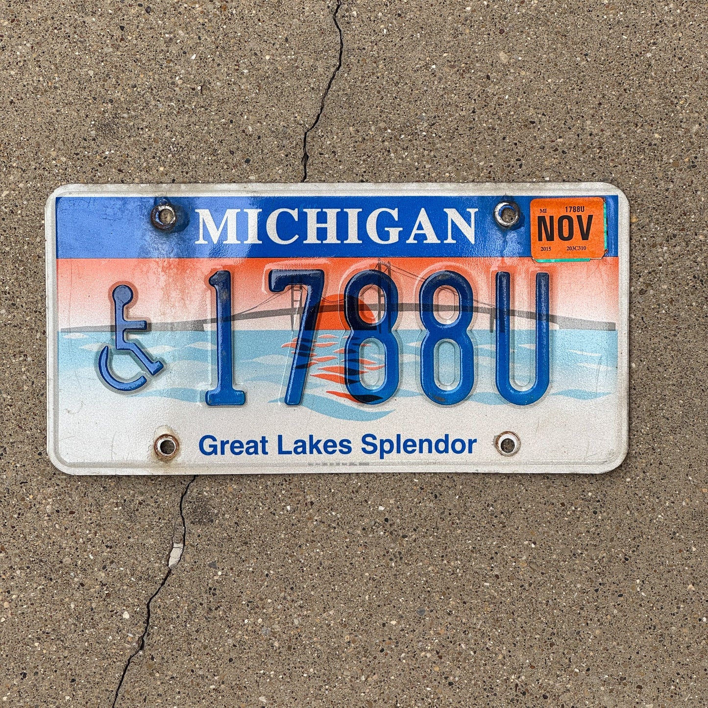 Photo of a 1997 Michigan Handicapped License Plate Auto Tag Garage Decor Vintage Graphic / Specialty Great Lakes Splendor 1788 U