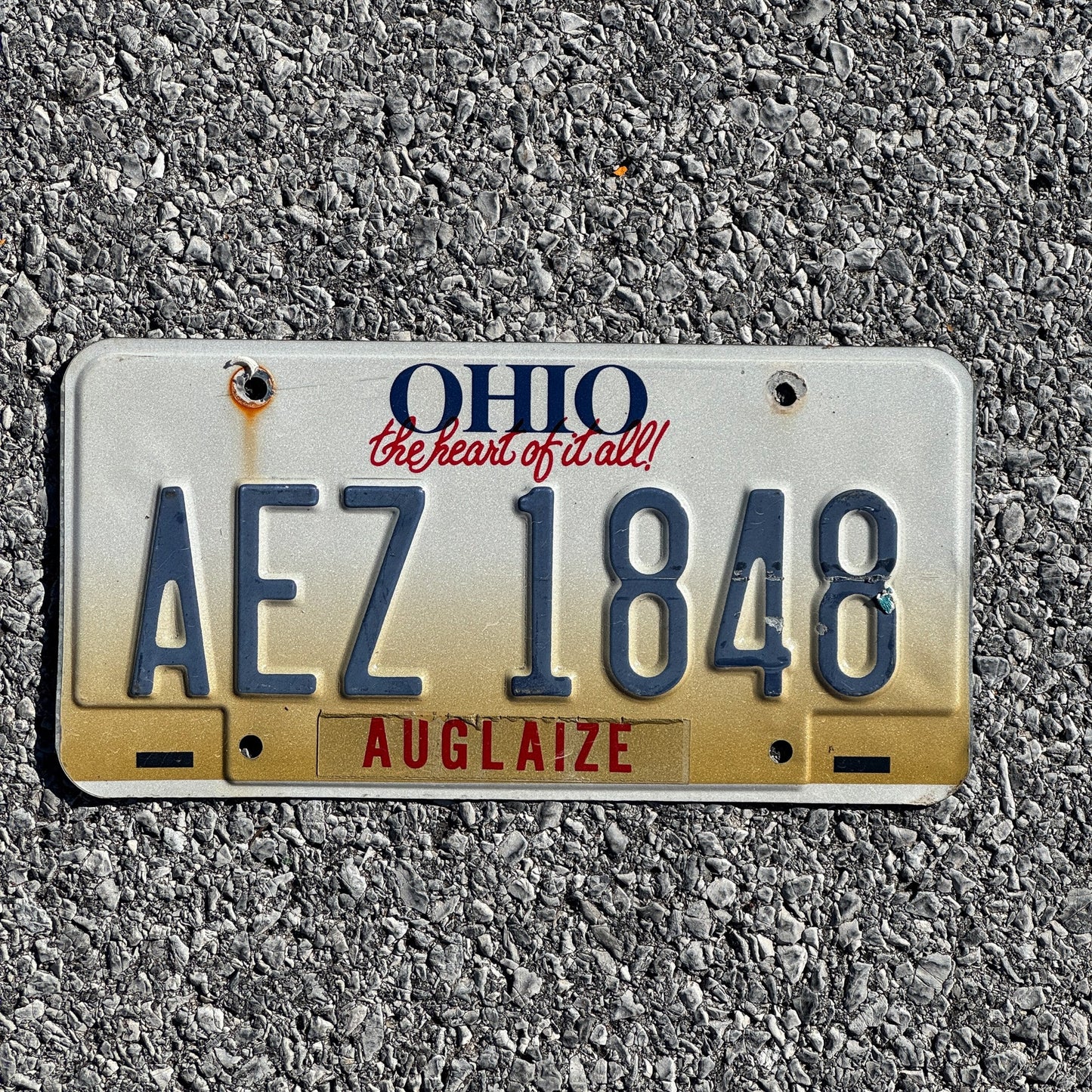 Photo of a 1997 Ohio License Plate Auto Tag Garage Decor Vintage AEZ 1848