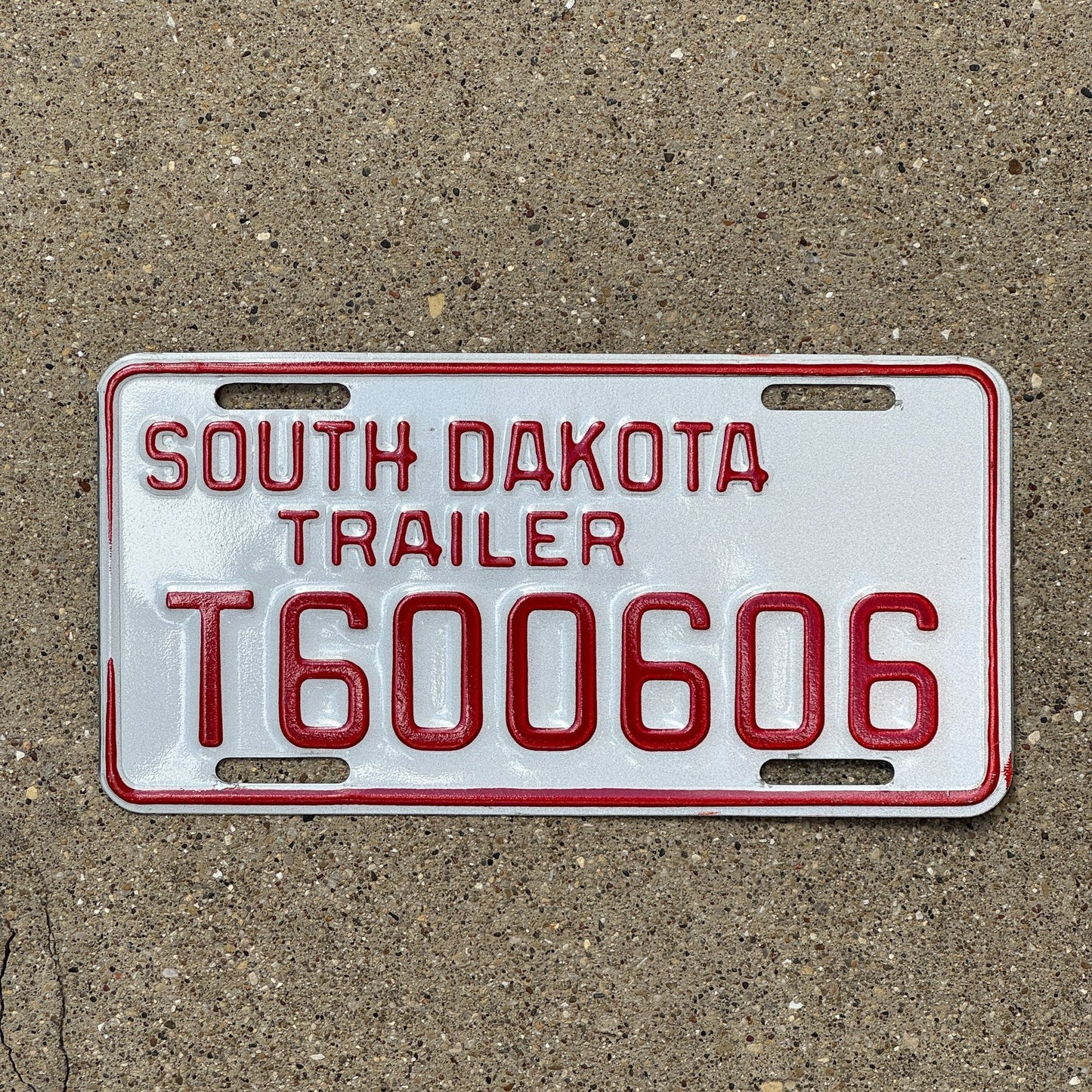 Photo of a 1997 South Dakota Trailer License Plate Auto Tag Garage Decor Vintage T 600 606