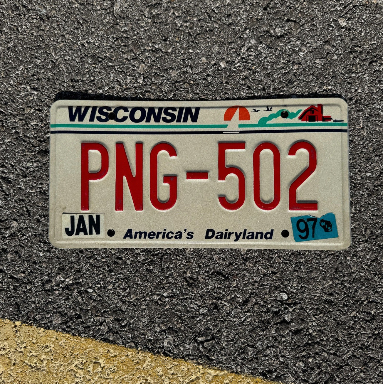 Photo of a 1997 Wisconsin License Plate Auto Tag Garage Decor Vintage Image Camera PNG 502