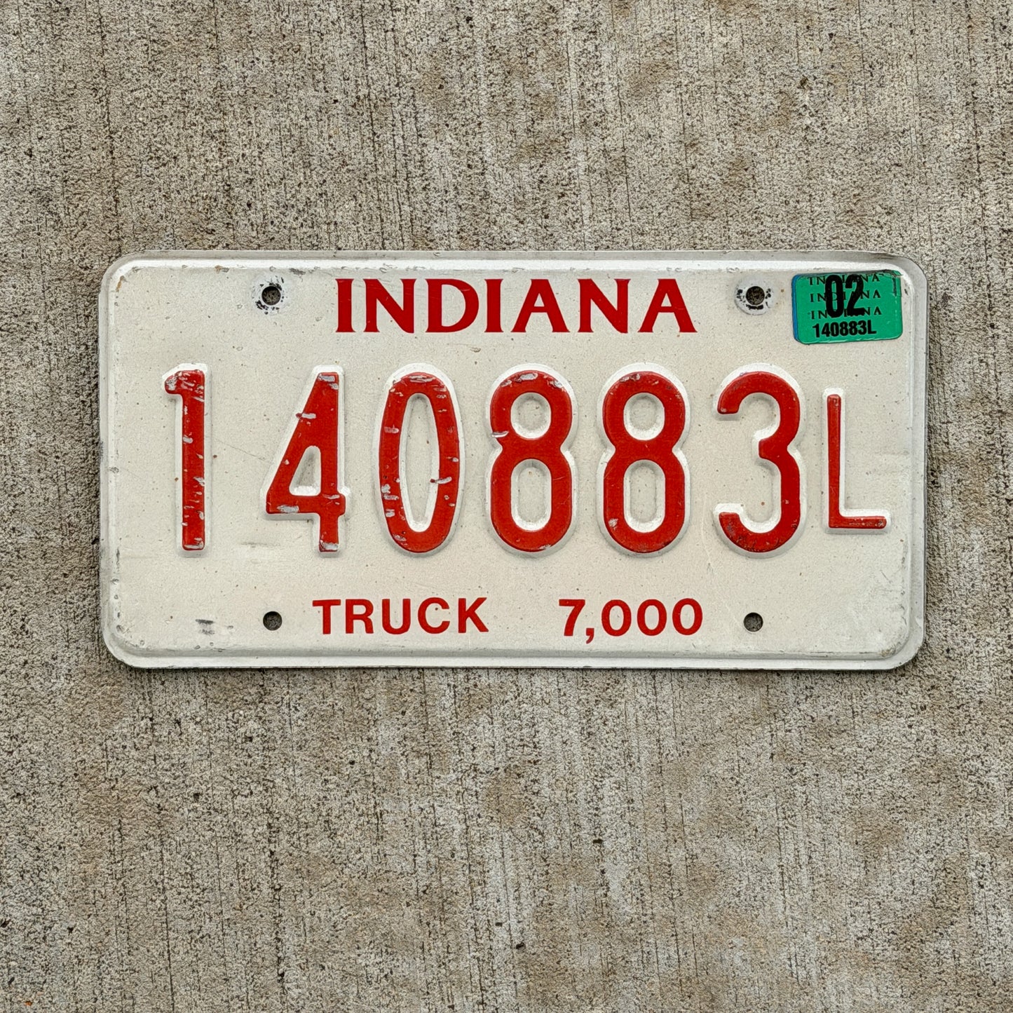 Photo of a 1998 2002 Indiana Truck License Plate Auto Tag Garage Decor Vintage 1 40883 L with original patina