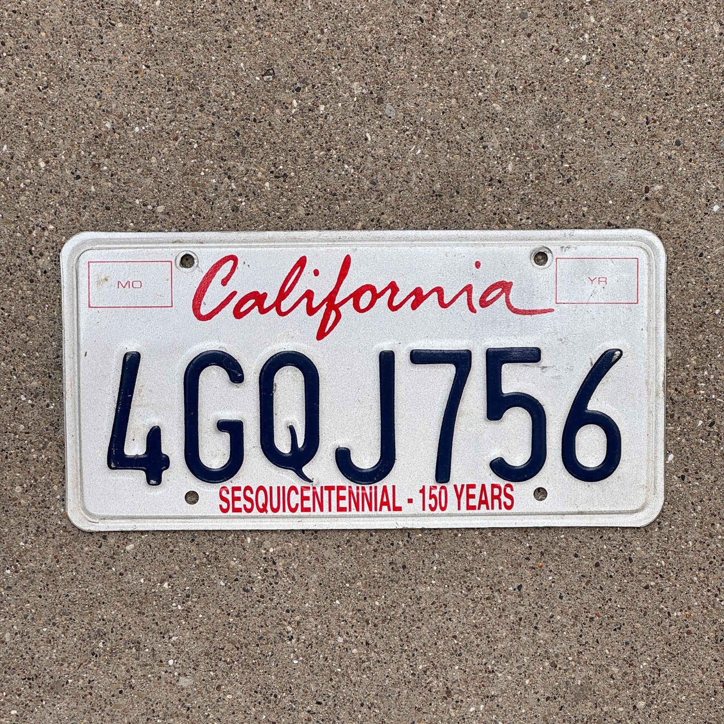 Photo of a 1998 California License Plate Auto Tag Garage Decor Vintage Lipstick Base 4 GQJ 756