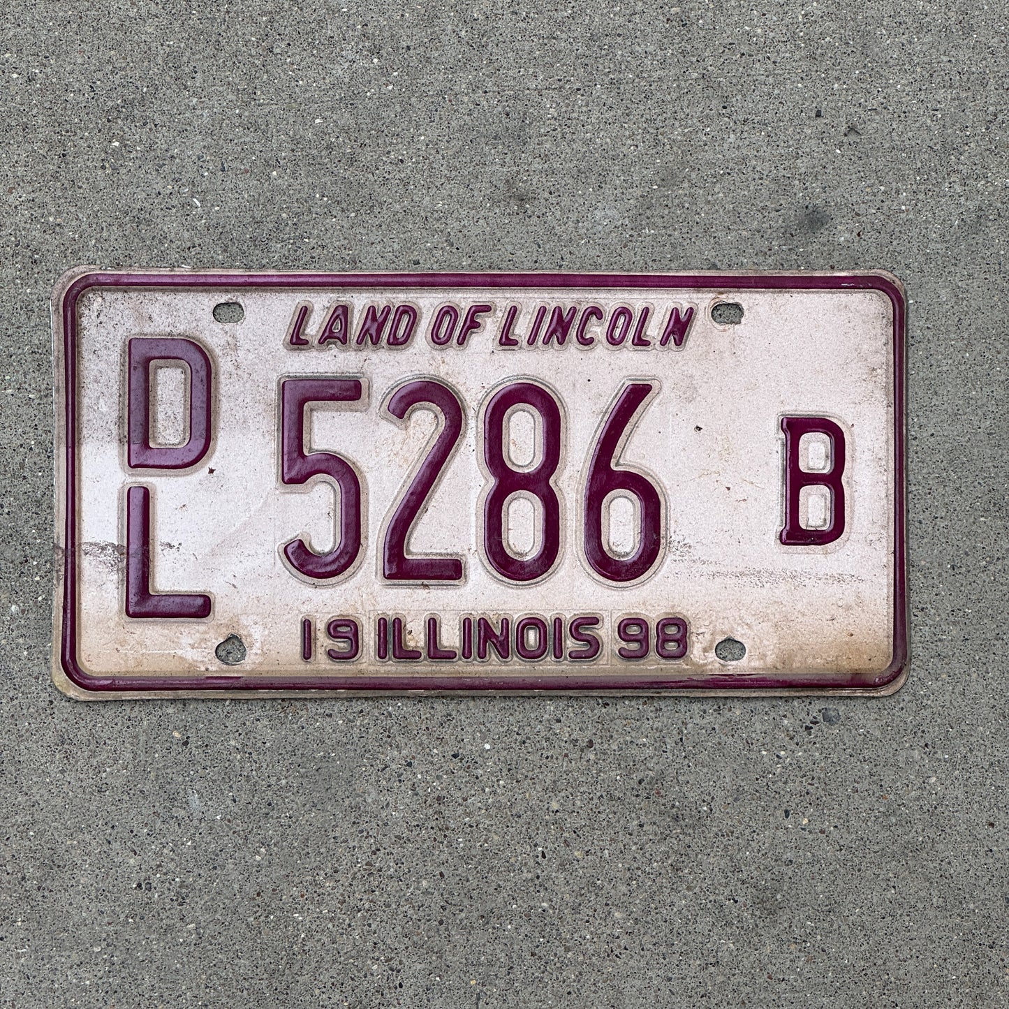 Photo of a 1998 Illinois Dealer License Plate Auto Tag 1 Vintage Garage 5286 B with original patina