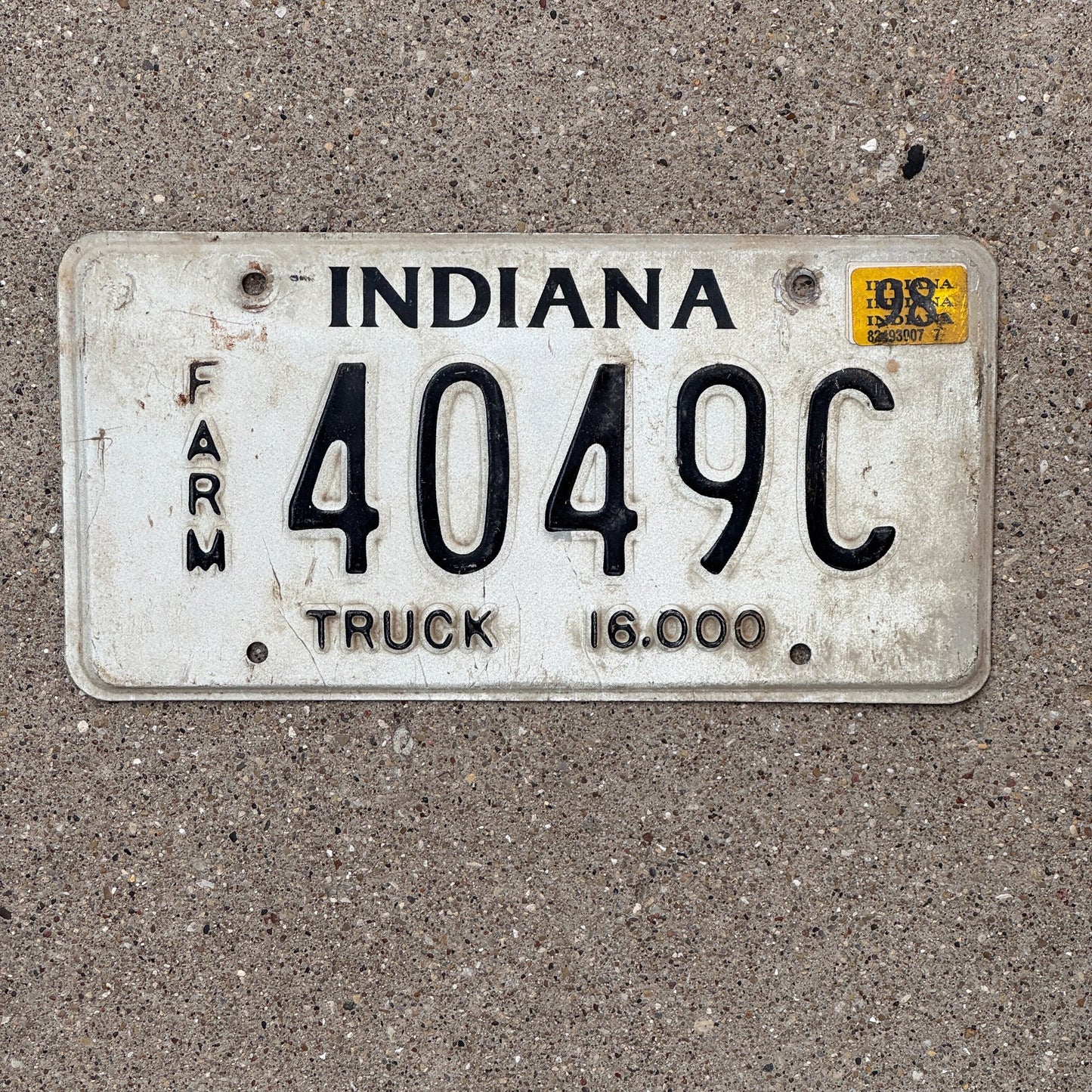 Photo of a 1998 Indiana FARM TRUCK License Plate Auto Tag Garage Decor Vintage 4049 C