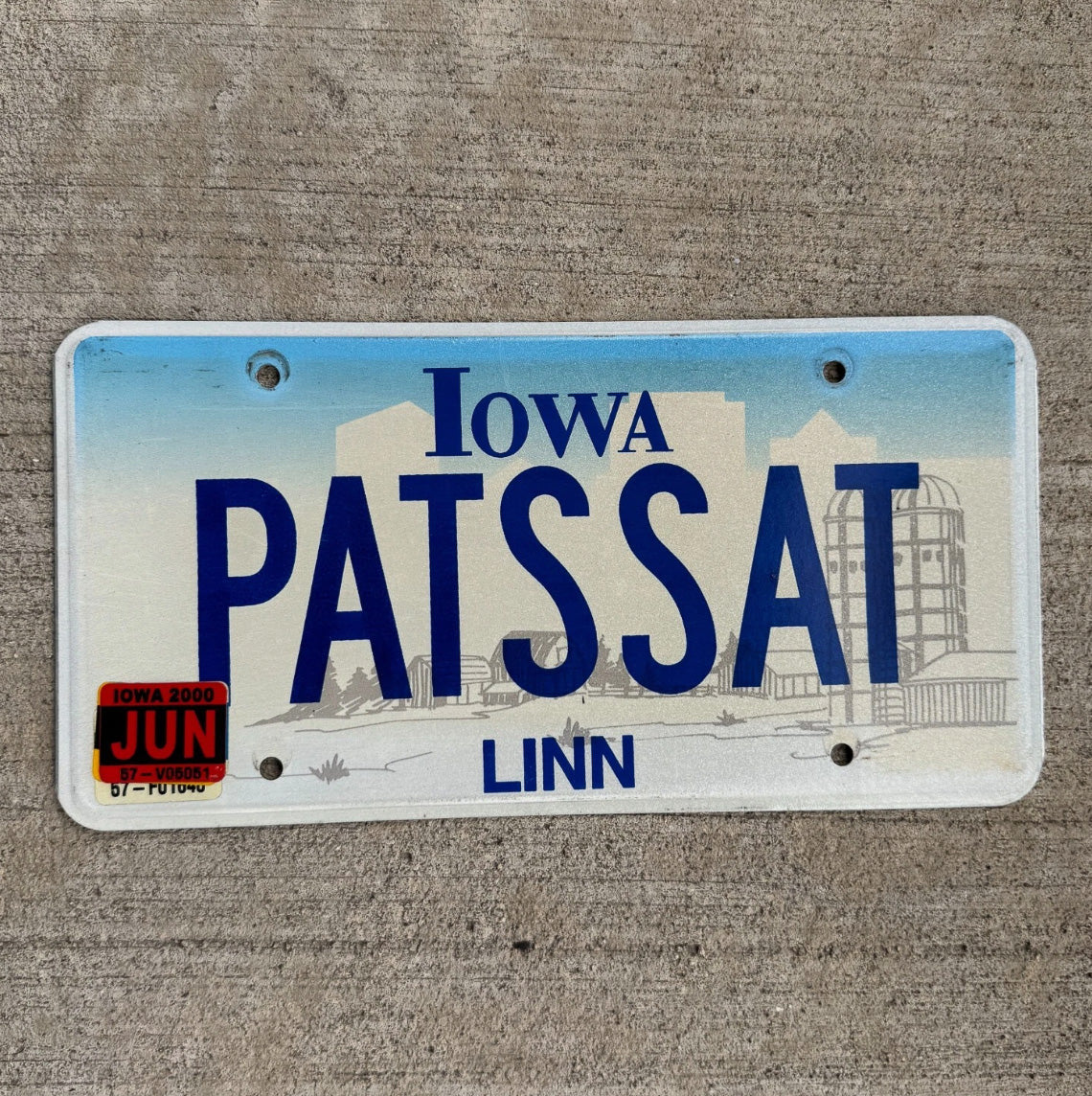 Photo of a 1998 Iowa Vanity License Plate Auto Tag Garage Linn County Pat's Saturn PATS SAT