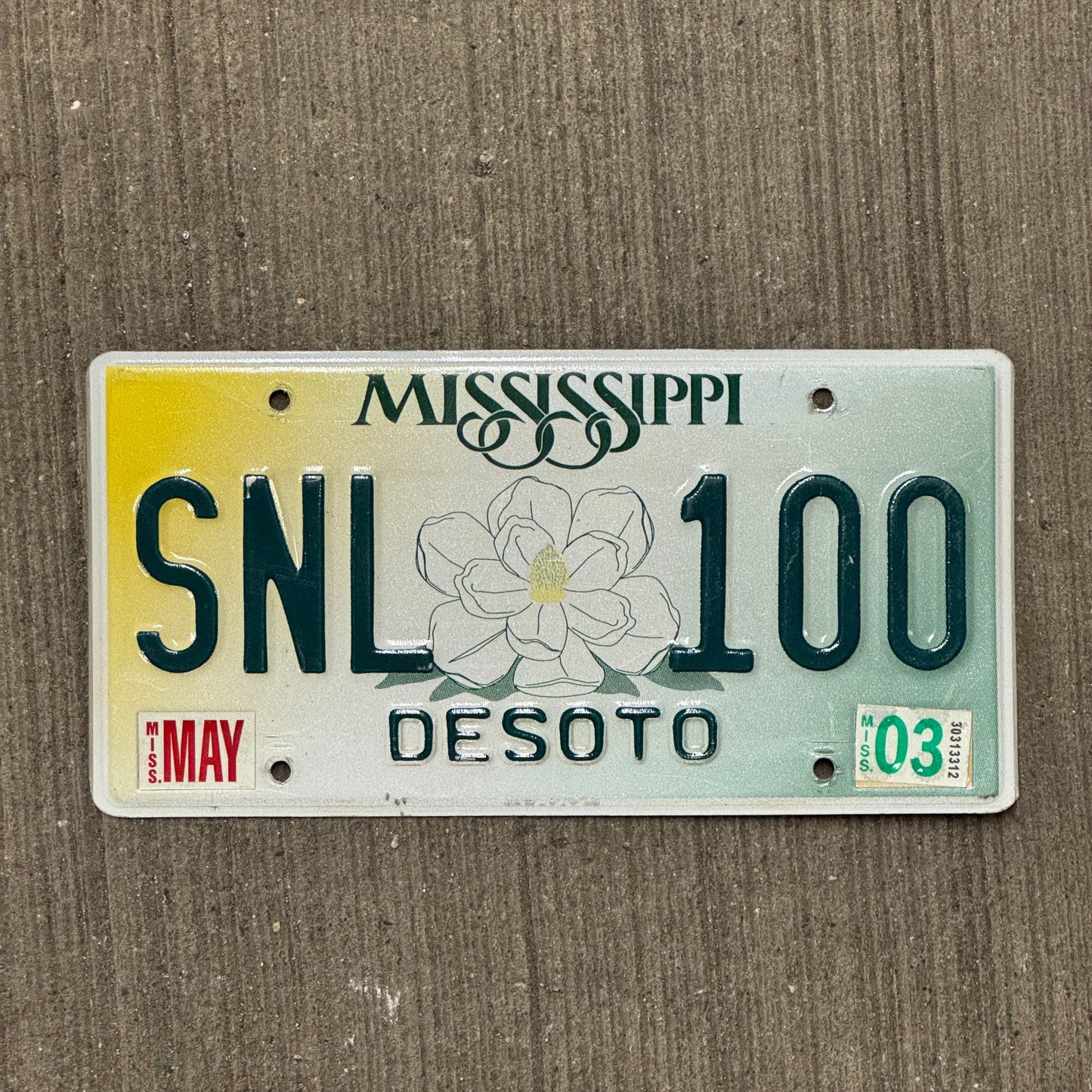 Photo of a 1998 Mississippi License Plate Auto Tag Garage Decor Vintage Comedy SNL 100