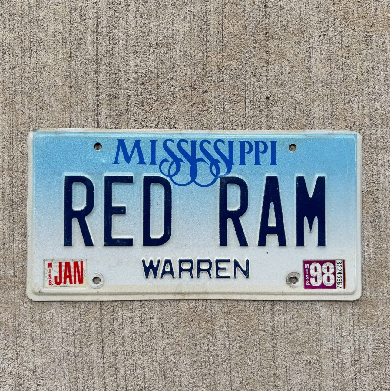 Photo of a 1998 Mississippi Vanity License Plate Auto Tag Garage Decor Vintage Dodge RED RAM