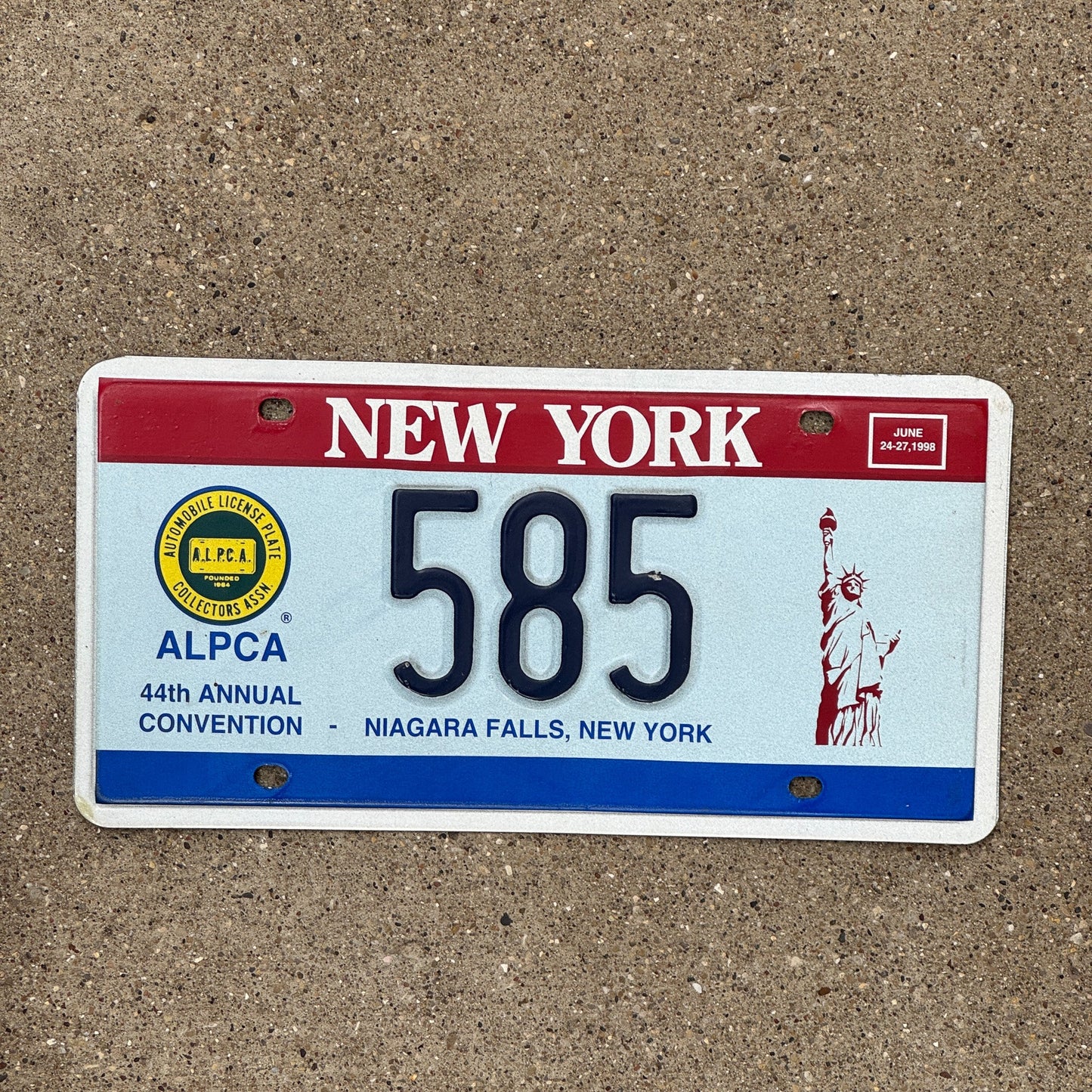 Photo of a 1998 New York License Plate Auto Tag Garage Decor Vintage Niagara Falls ALPCA Convention 585