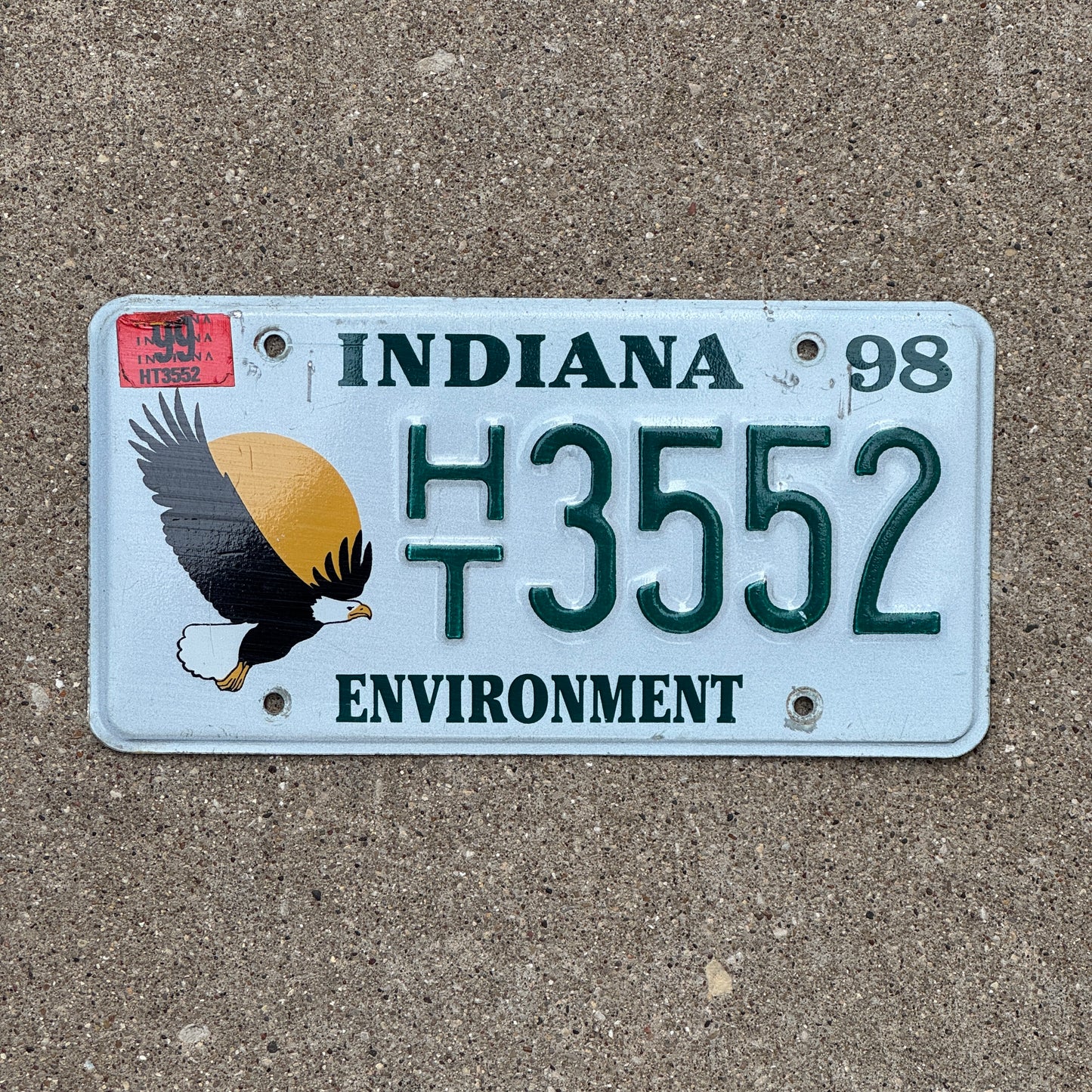 Photo of a 1998 Indiana ENVIRONMENT License Plate Auto Tag Bald Eagle Birds Nature HT 3552