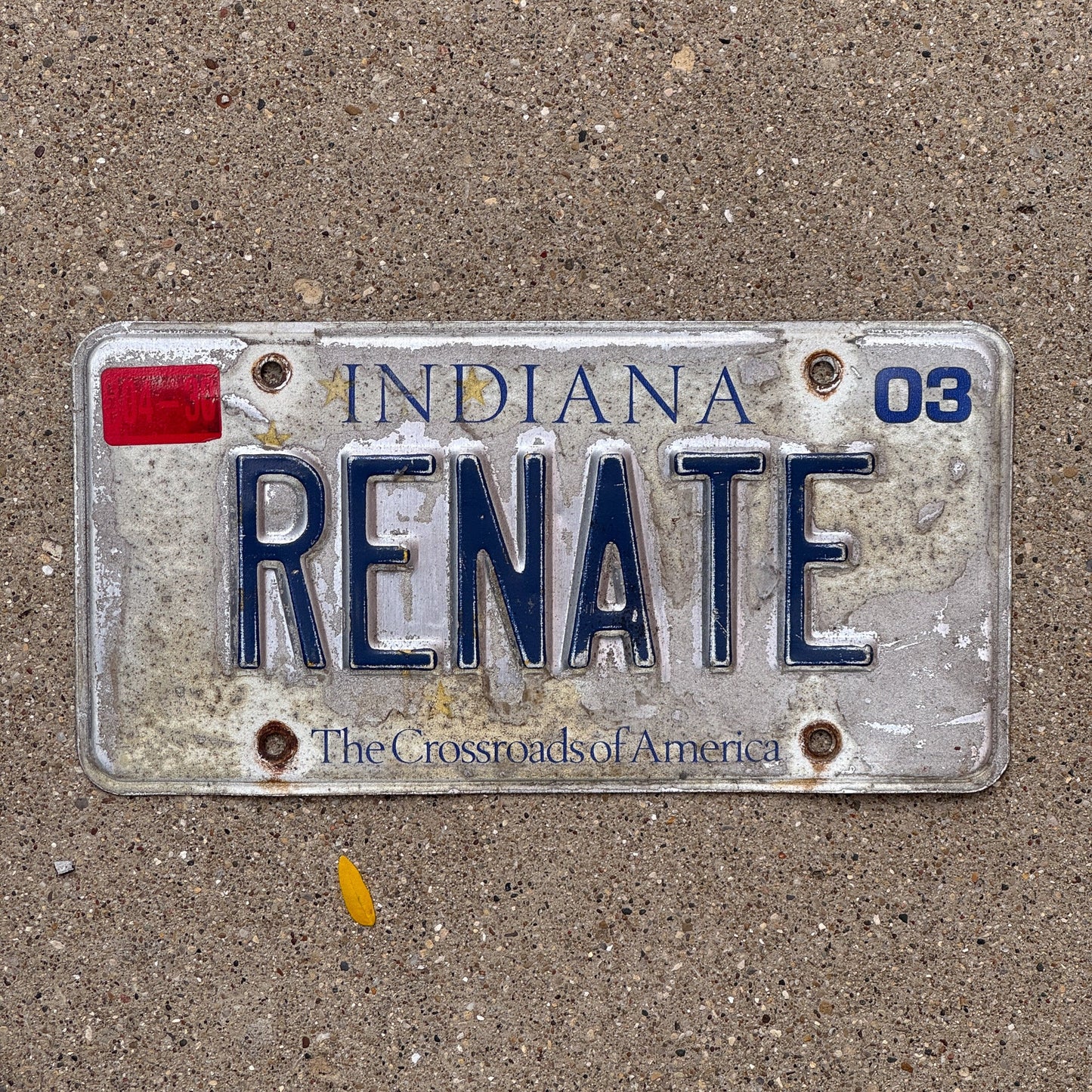 Photo of a 1999 2003 Indiana Vanity License Plate Auto Tag Garage Decor Vintage RENATE with original patina