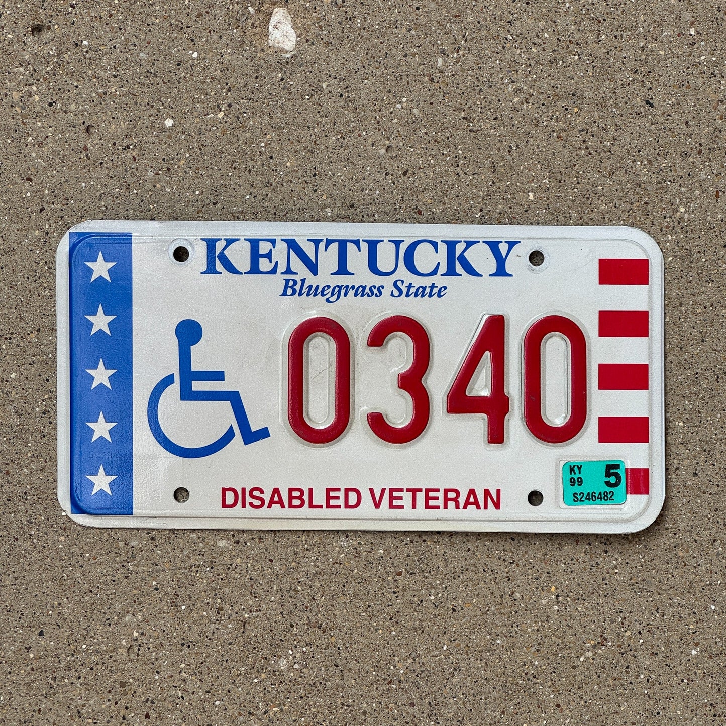 Photo of a 1999 Kentucky Disabled Veteran License Plate Auto Tag Garage Decor Vintage Military Natural 1999 Sticker 0340