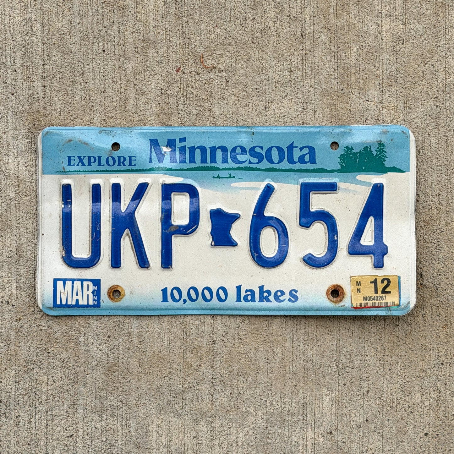 Photo of a 2000 2012 Minnesota License Plate Auto Tag Garage Decor Vintage UKP 654 with original patina