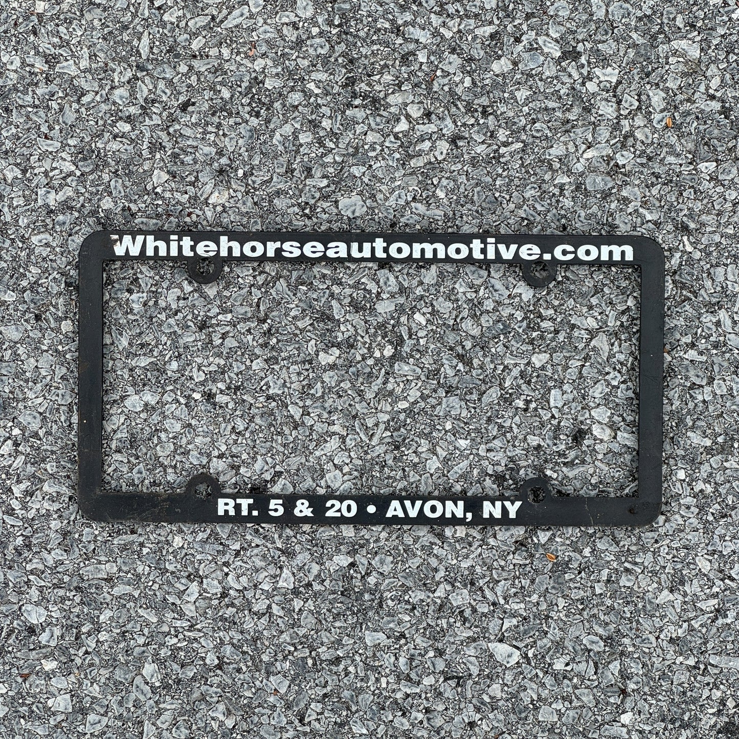 Photo of a 2000 Era New York License Plate Auto Tag Garage Decor Vintage Plastic White Horse Automotive License Plate Frame