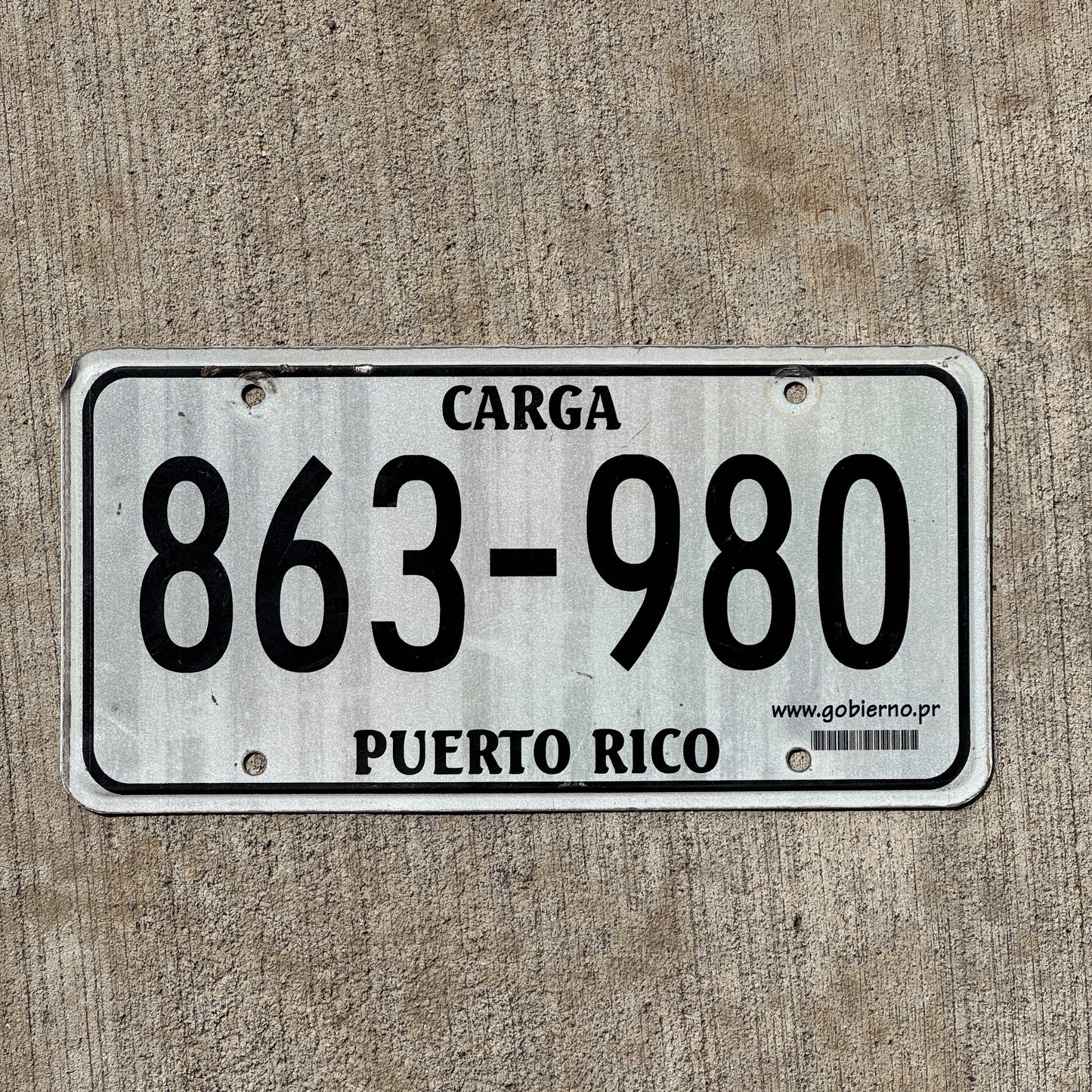 Photo of a 2000 Era Puerto Rico Carga License Plate Auto Tag Garage Decor Vintage Truck 863 980 with original patina