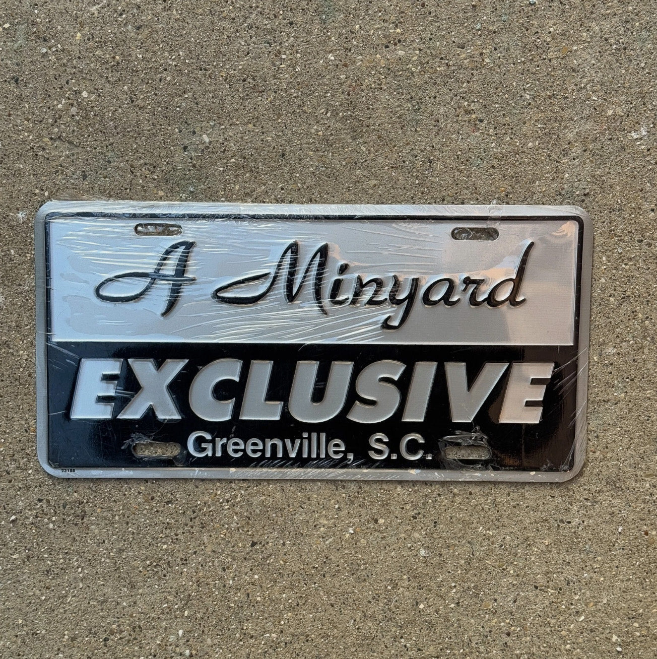 Photo of a 2000 Era South Carolina Booster License Plate Auto Tag Garage Decor Vintage Greenville Dealer Minyard