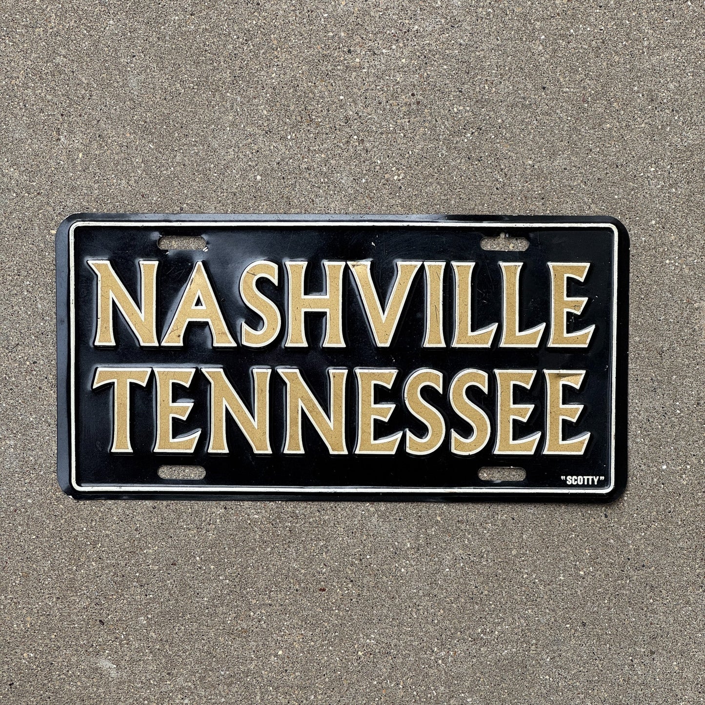 Photo of a 2000 Era Tennessee Booster License Plate Auto Tag Garage Decor Vintage Nashville
