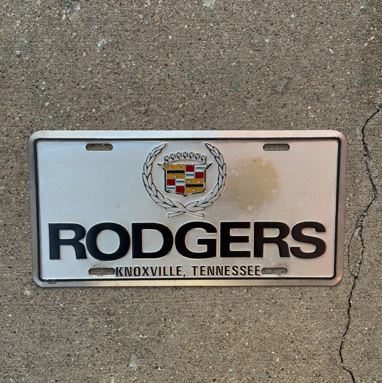 Photo of a 2000 Era Tennessee Booster License Plate Auto Tag Garage Decor Vintage Rodgers Cadillac Knoxville
