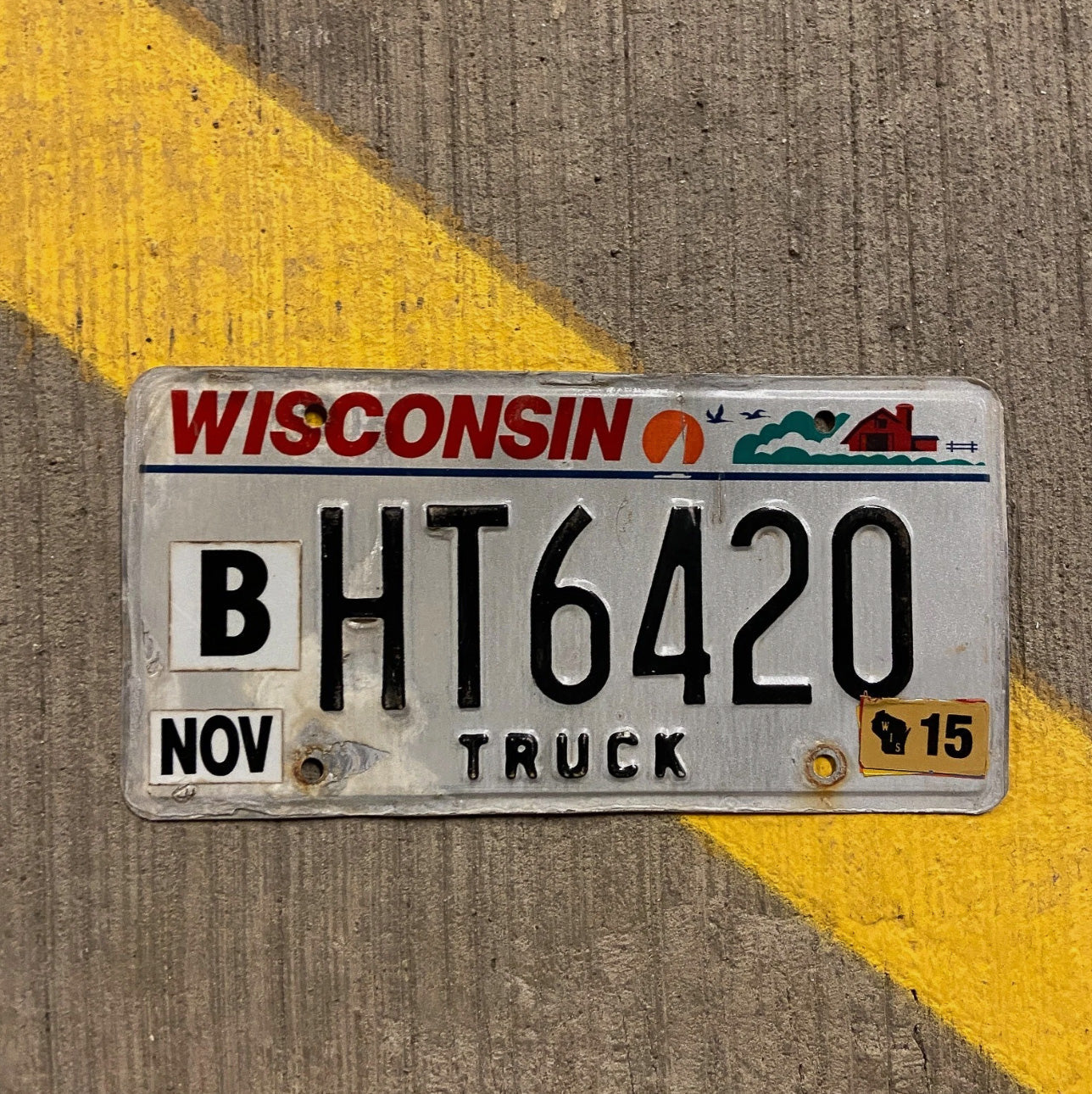 Photo of a 2000 Wisconsin Truck License Plate Auto Tag Garage Decor Vintage 420 Weed HT 6420