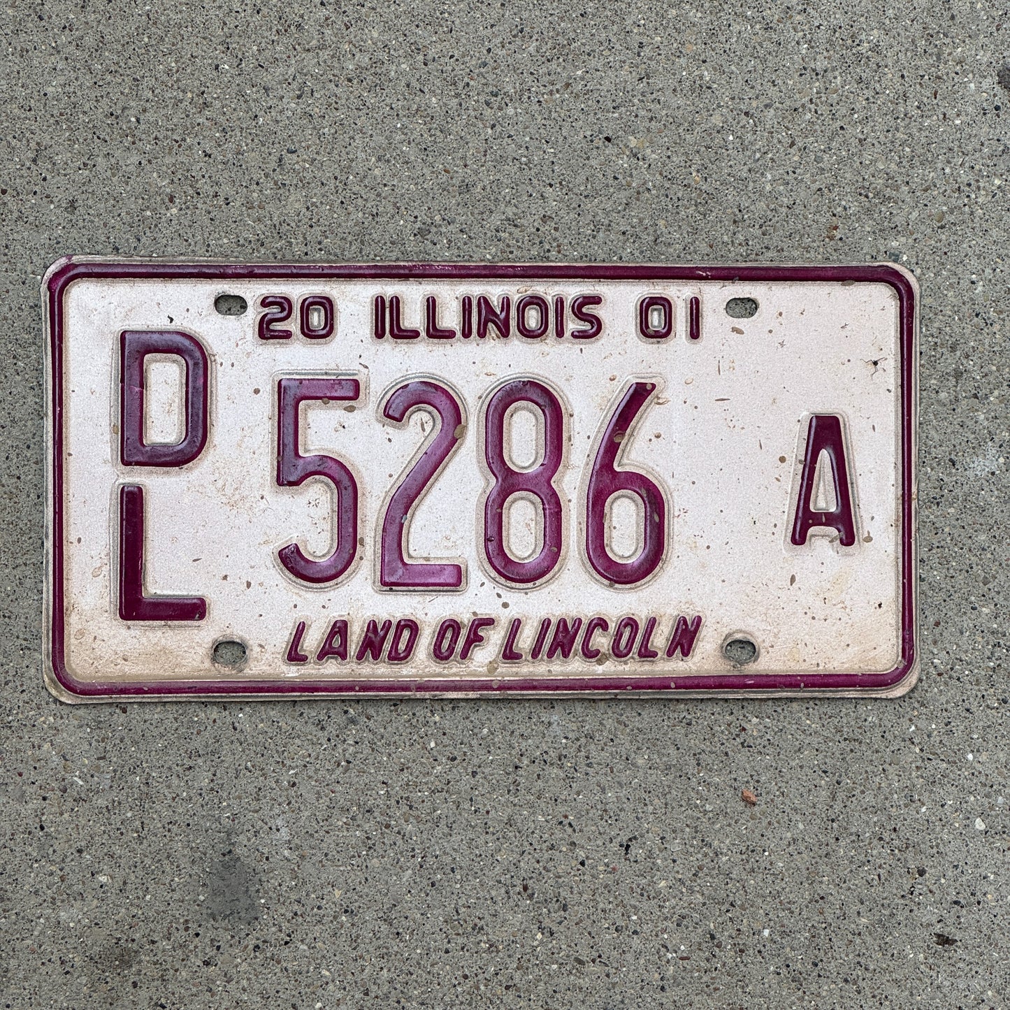 Photo of a 2001 Illinois Dealer License Plate Auto Tag 1 Vintage Garage 5286 A with original patina